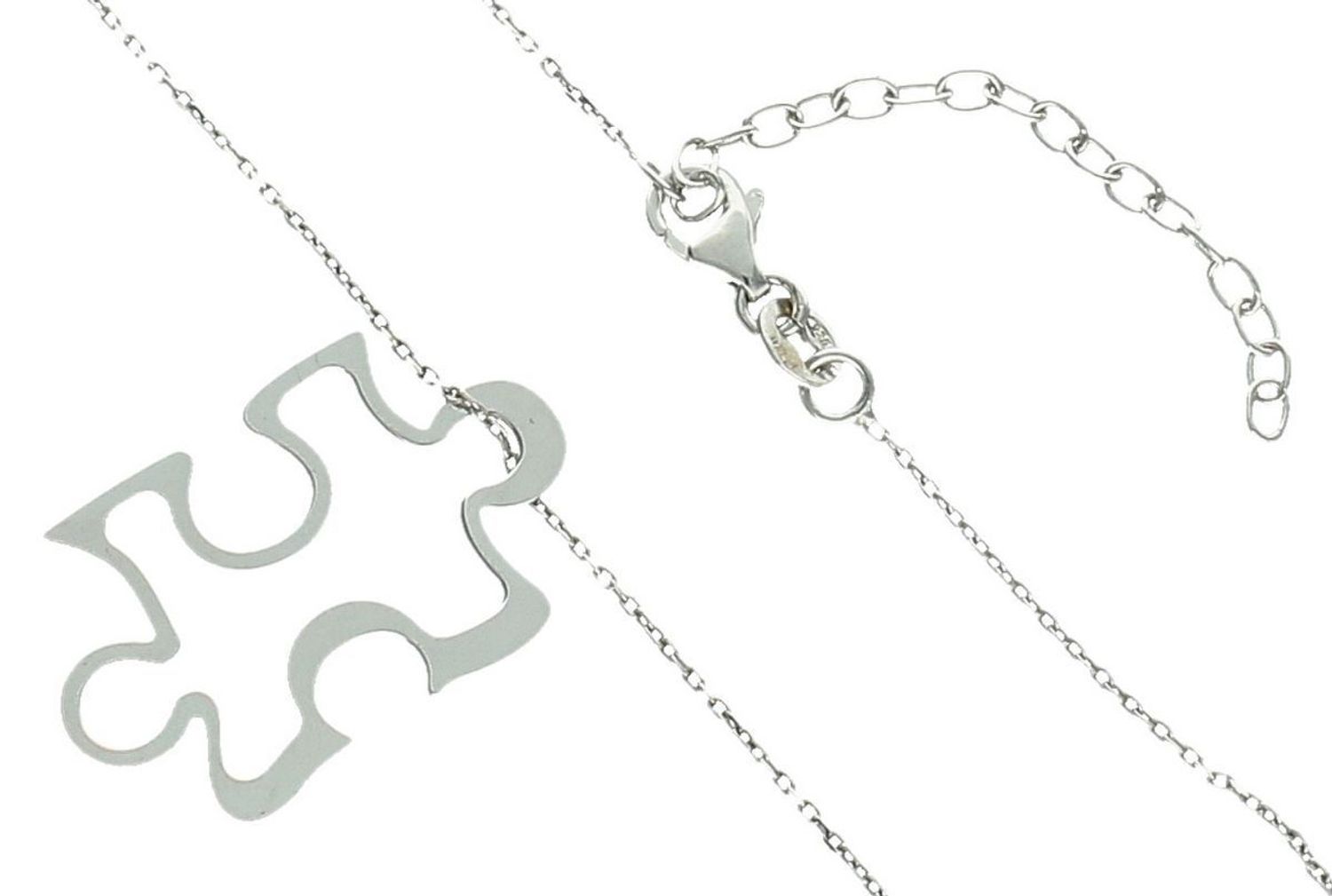Srebrny naszyjnik damski DIA-NSZ-PUZEL-3CM-925 z zawieszką w kształcie puzzla o wymiarach 3 × 2 cm. Wykonany ze srebra próby 925, długość 42 + 5 cm, waga 2,50 g, zapięcie na karabińczyk. 1.jpg