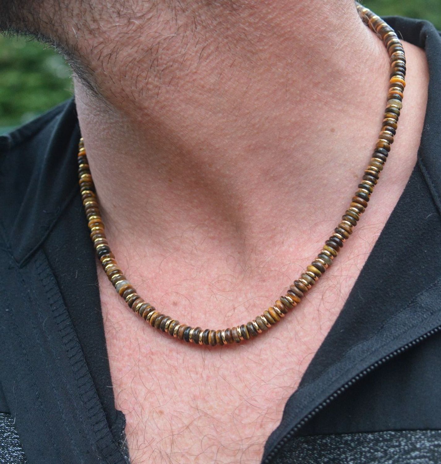 Naszyjnik z pozłacanej stali ozdobiony naturalnym tygrysim okiem. Długość 50 + 5 cm, zapięcie na karabińczyk. Styl boho i siła kamieni naturalnych w jednym.1.jpg