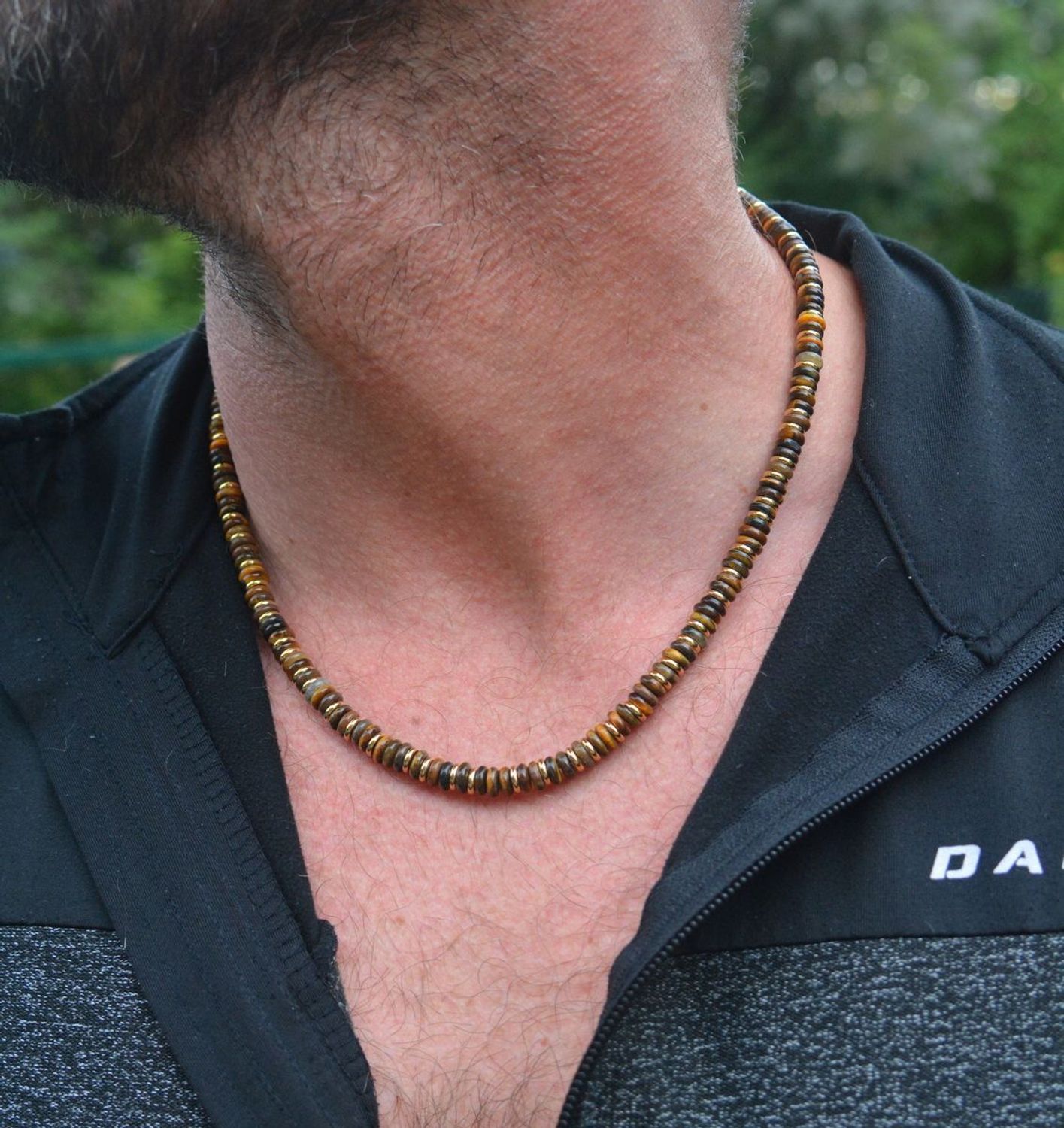 Naszyjnik z pozłacanej stali ozdobiony naturalnym tygrysim okiem. Długość 50 + 5 cm, zapięcie na karabińczyk. Styl boho i siła kamieni naturalnych w jednym.1.jpg