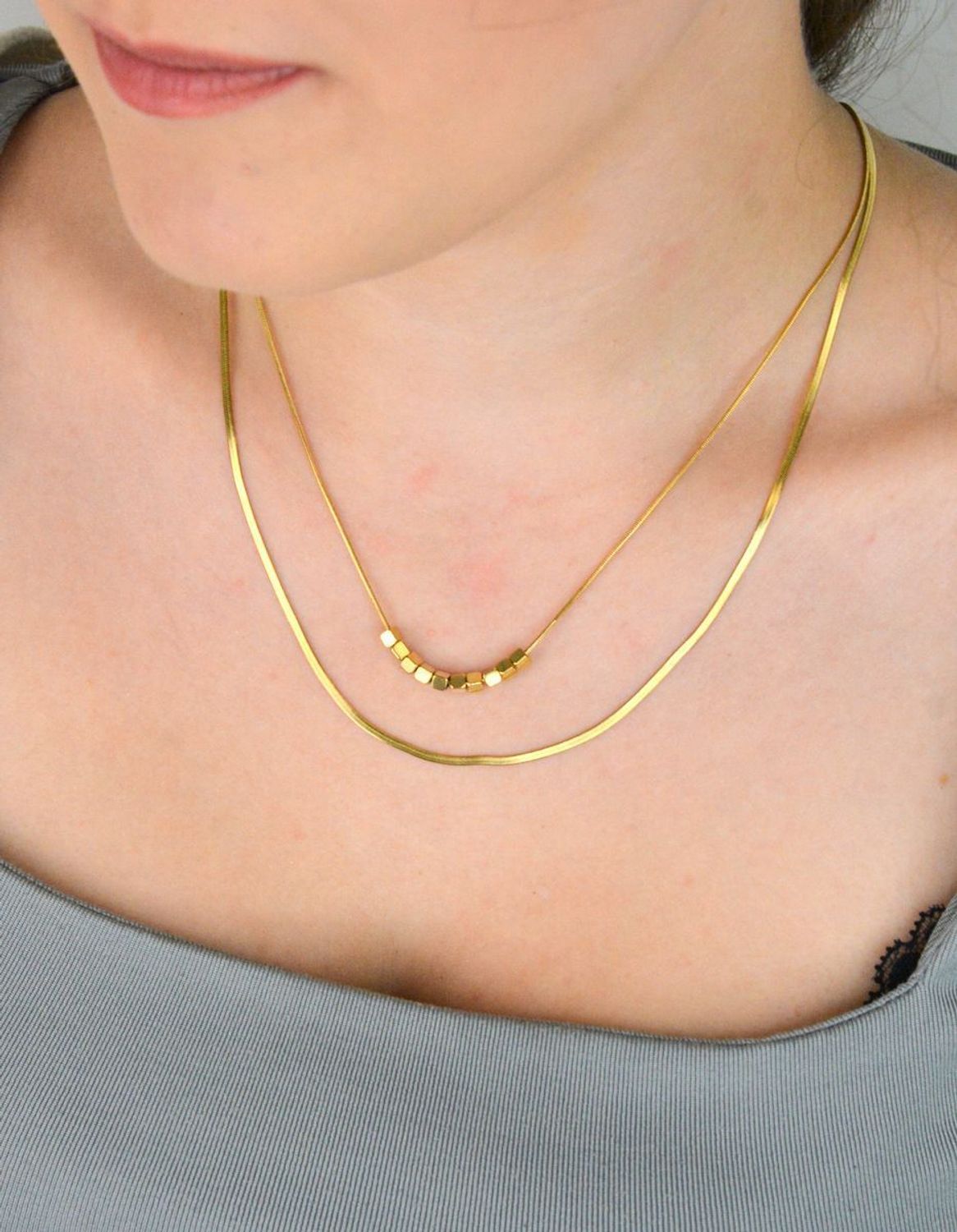 Naszyjnik damski stalowy podwójny z kosteczkami pozłacanymi  DIA-NSZ-W5522436-STAL stal.jpg