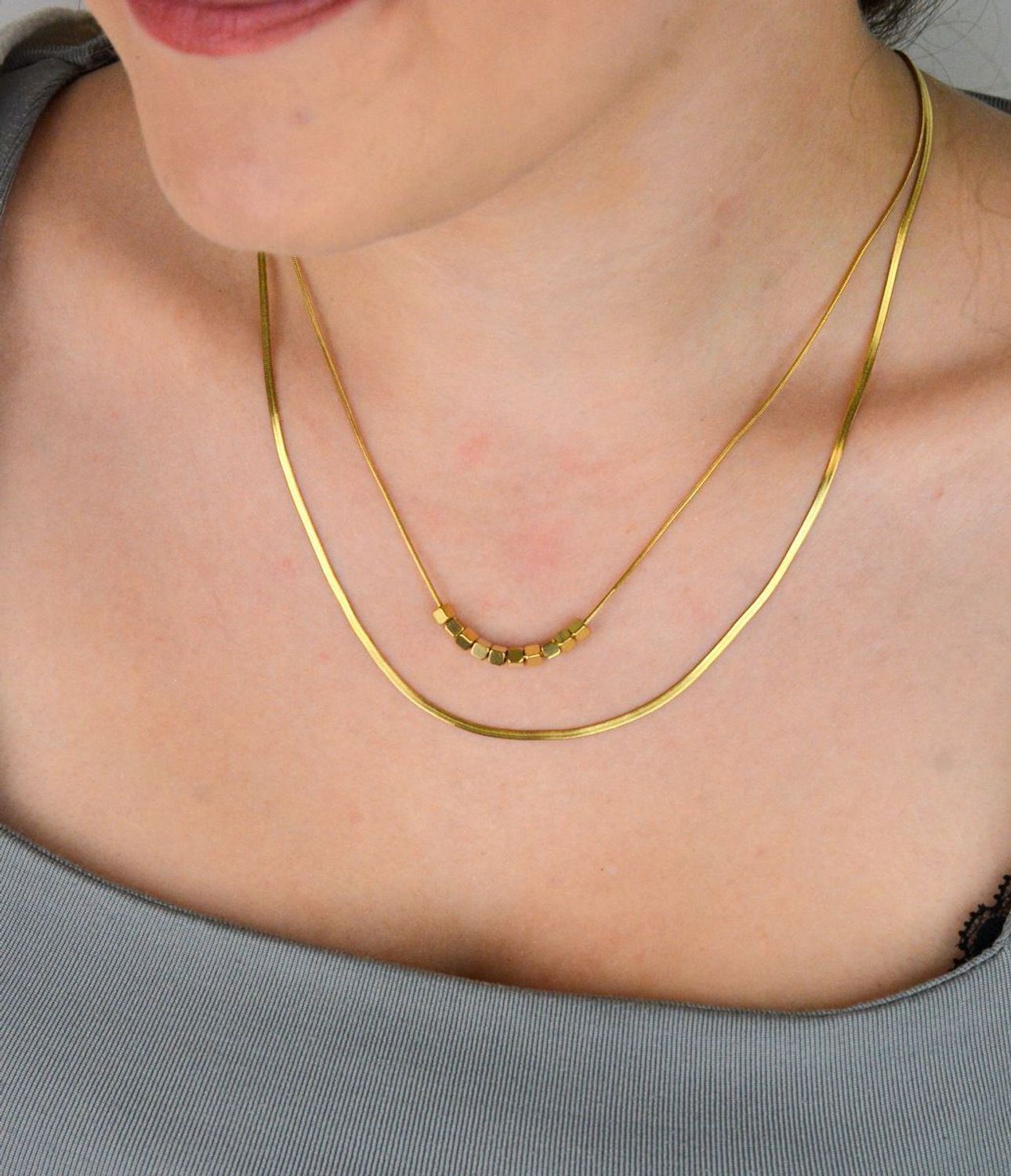 Naszyjnik damski stalowy podwójny z kosteczkami pozłacanymi  DIA-NSZ-W5522436-STAL stal.jpg