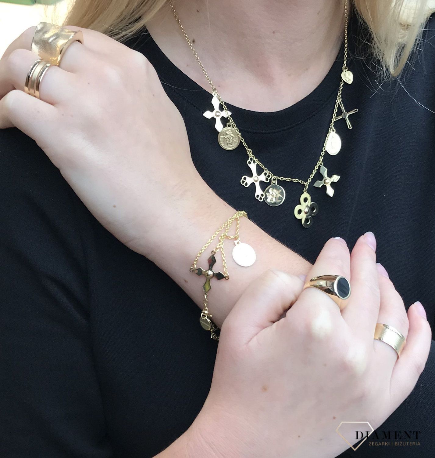 Pierścionek złoty szeroki 585 z eleganckim tłoczeniem DIA-PI-205295-585.jpg