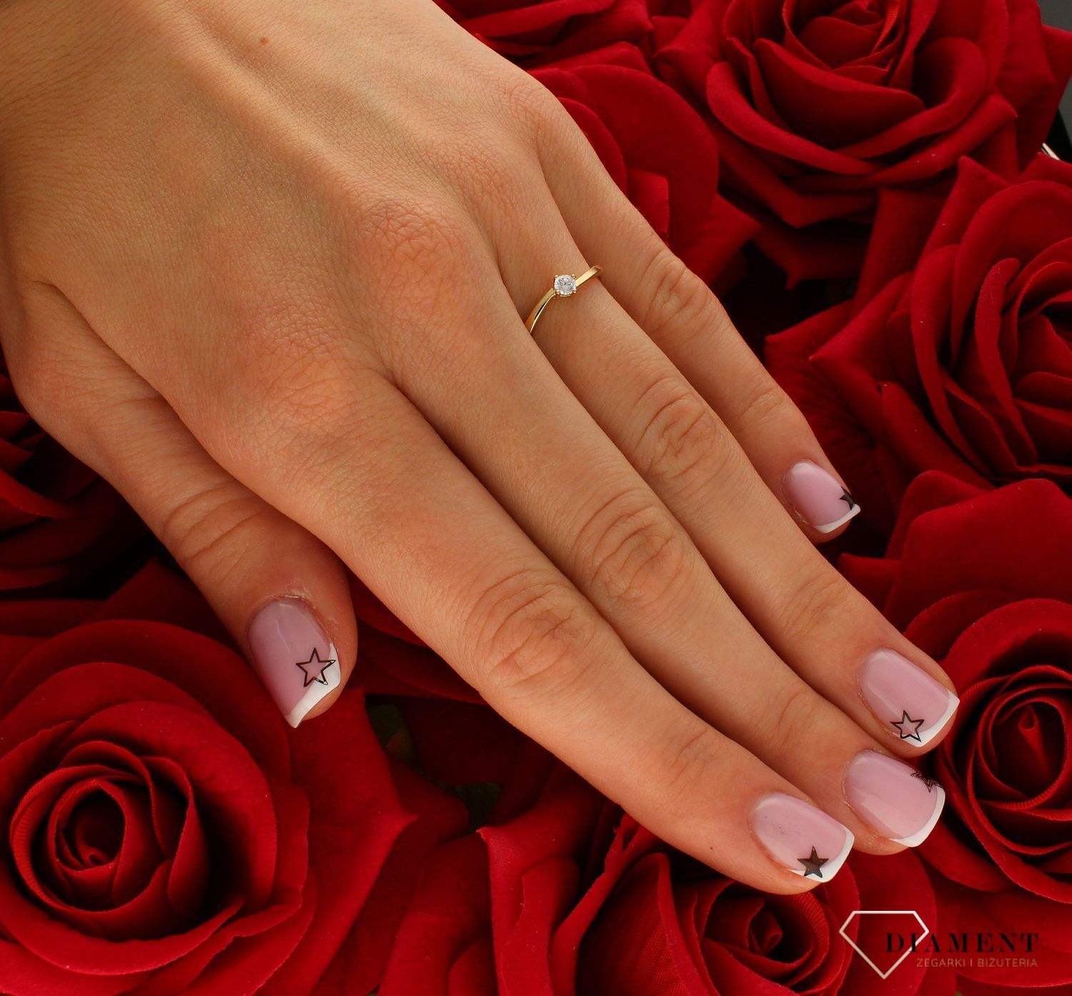 Pierścionek damski złoty Biała iskierka 585.jpg