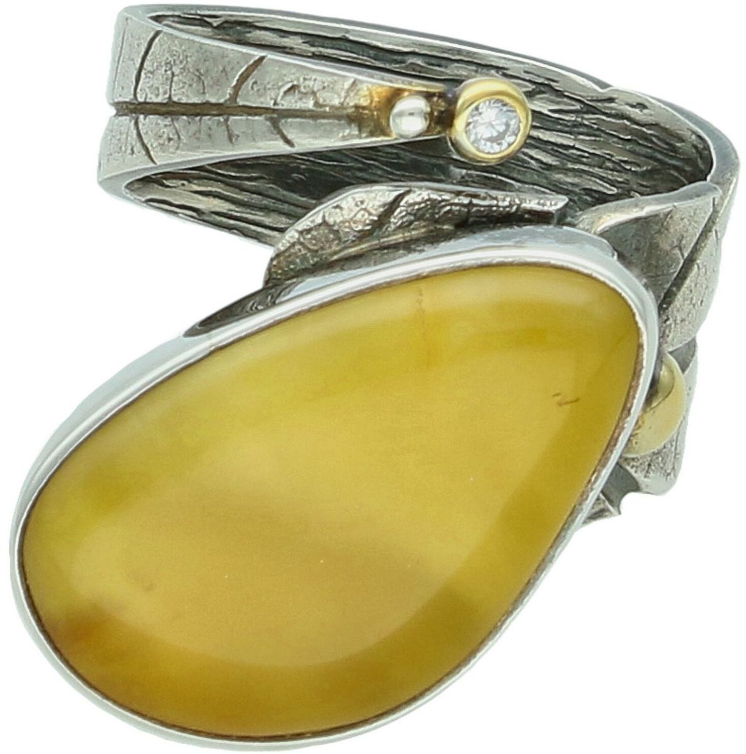 Pierścionek damski srebrny DIA-PRS-10669-925 z bursztynem, geometryczny design, srebro próby 925, wymiary kamienia 2,2 x 1,5 cm, waga 10,20 g. Elegancka i nowoczesna biżuteria idealna1.jpg