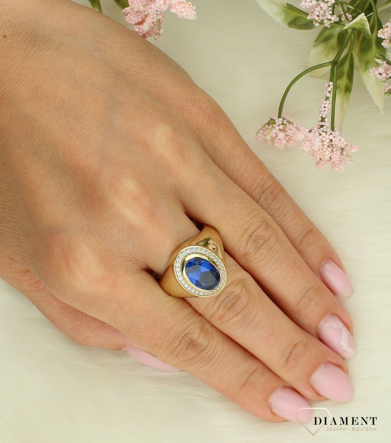 Złoty pierścionek damski 585 z niebieską owalną cyrkonią rozmiar 25 DIA-PRS-11930-585.jpg