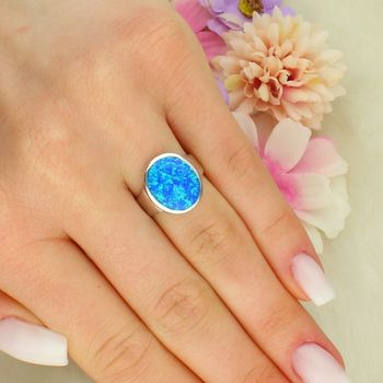 Srebrny pierścionek damski 925 z niebieskim opalem – elegancki blask natury DIA-PRS-14115-925 (2).jpg