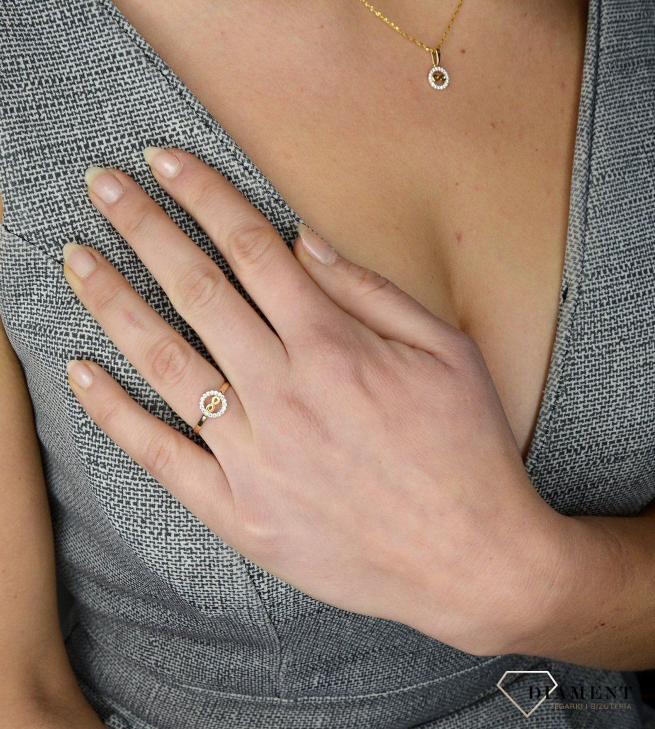 Złoty pierścionek nieskończoność z cyrkoniami 585.jpg