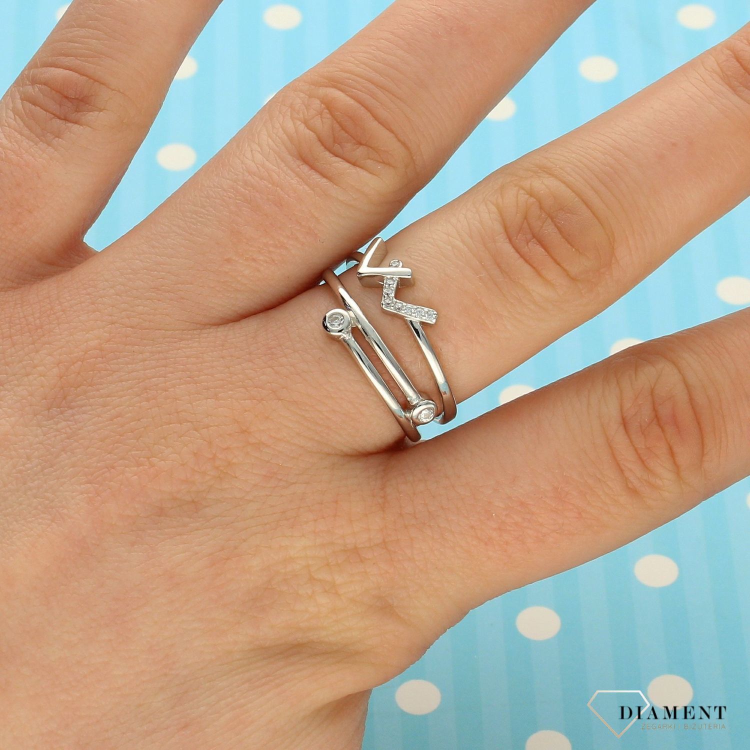 Pierścionek srebrny z oczkami  DIA-PRS-1940-925 (1).jpg