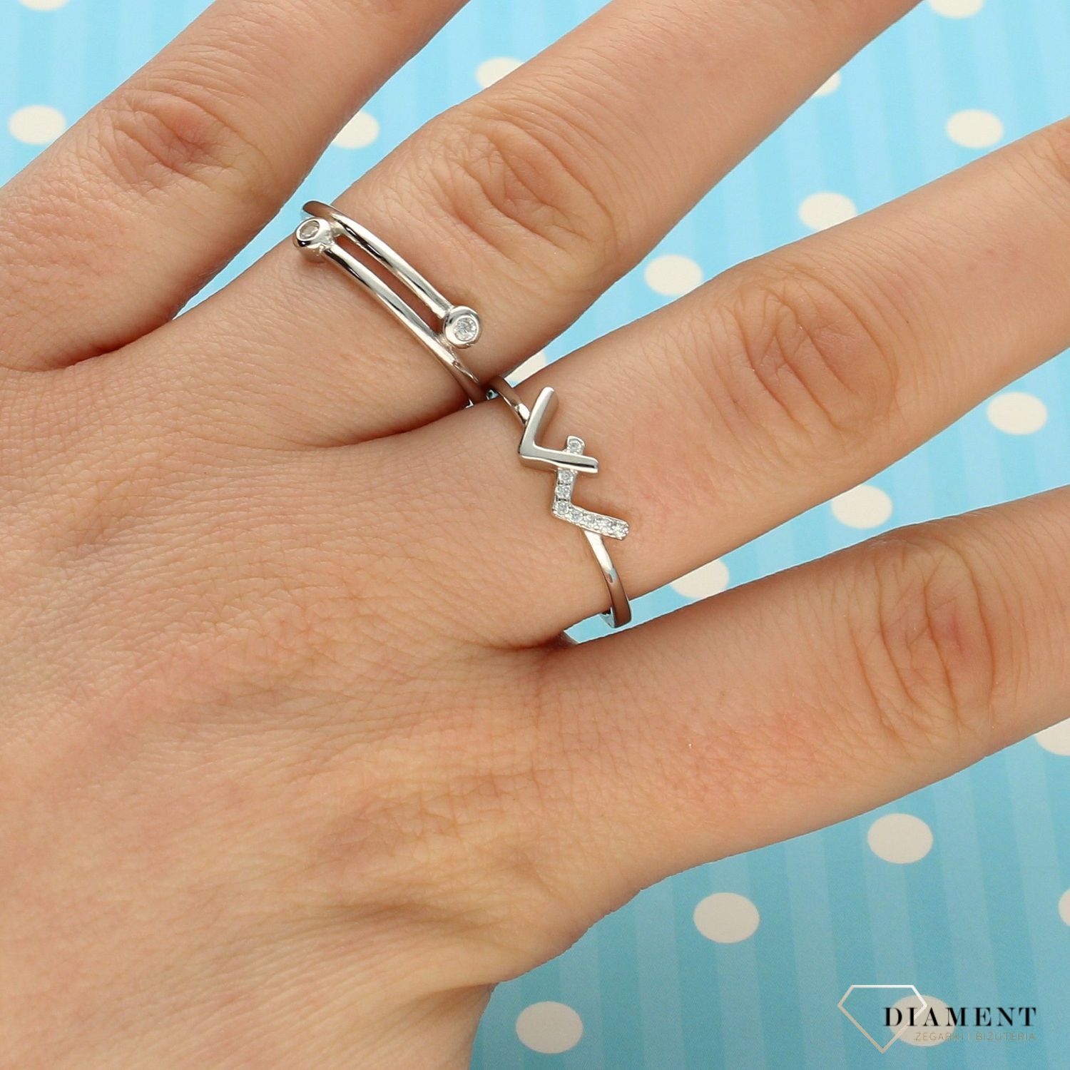 Pierścionek srebrny z cyrkoniami DIA-PRS-1947-925 (1).jpg