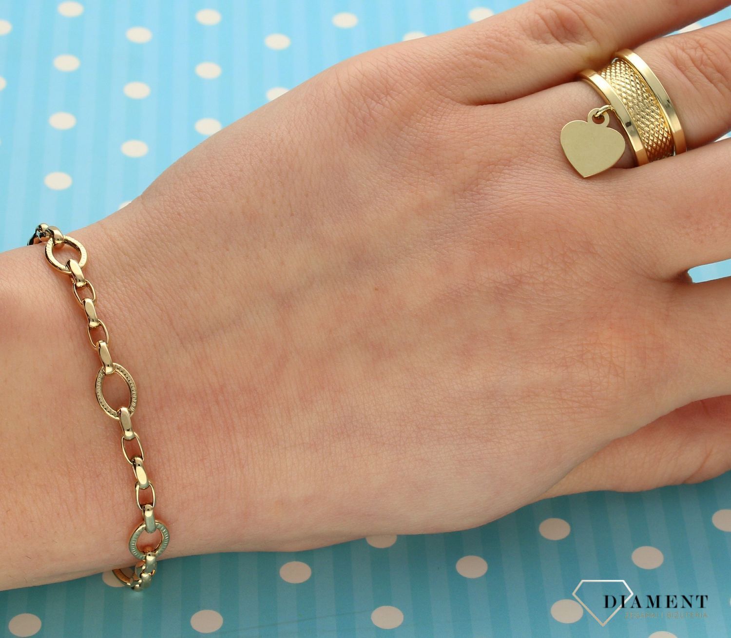 Złoty pierścionek 585 szeroka obrączka z wiszącym serduszkiem DIA-PRS-2670-585.jpg