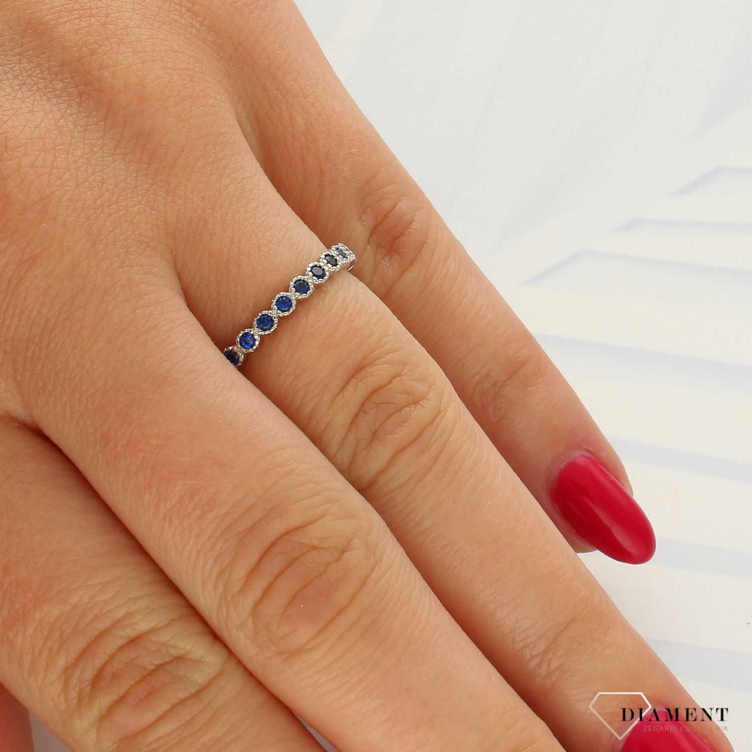 Srebrny pierścionek delikatna obrączka z niebieską cyrkonią DIA-PRS-3727-925 (1).jpg