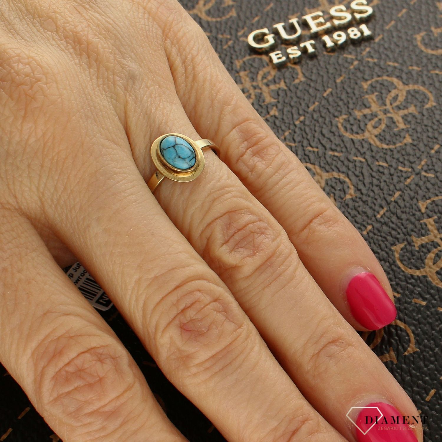 Złoty pierścionek z niebieskim oczkiem DIA-PRS-5089-333.jpg