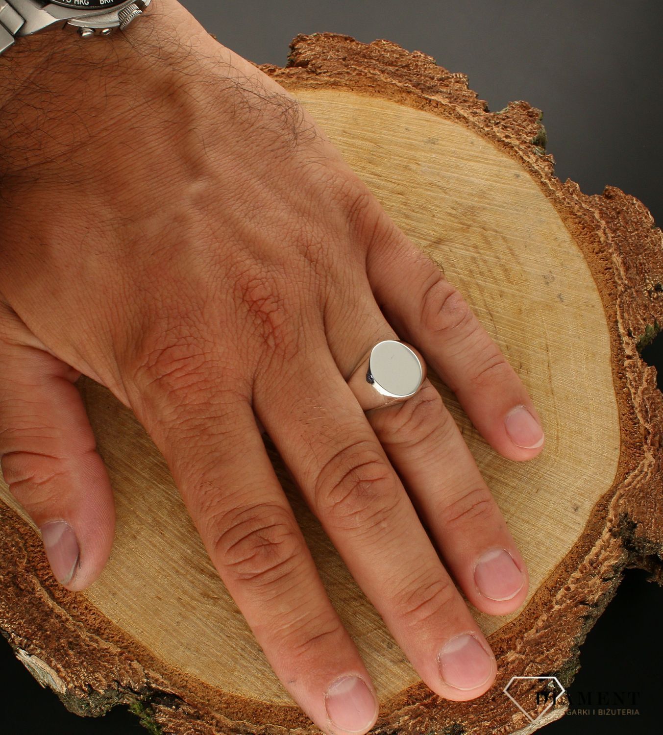 Pierścionek srebrny sygnet z okrągłym oczkiem 925 DIA-PRS-6310-925. Gładki sygnet wykonany z najwyższej próby srebra. Męska i da.jpg