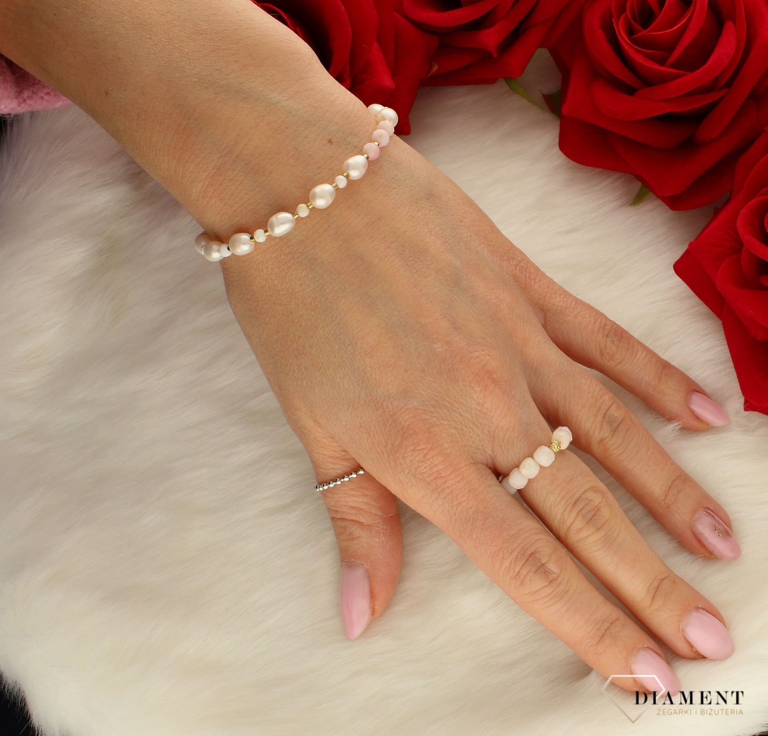 Pierścionek damski złoty 585 z kamieniem różowy opal DIA-PRS-8172-585.  Modny pierścionek z ozdobnych kuleczek na gumce to intrygująca biżuteria która spodoba się niezależnej, odważnej kobiecie, kochającej wyraziste dodatki,.jpg