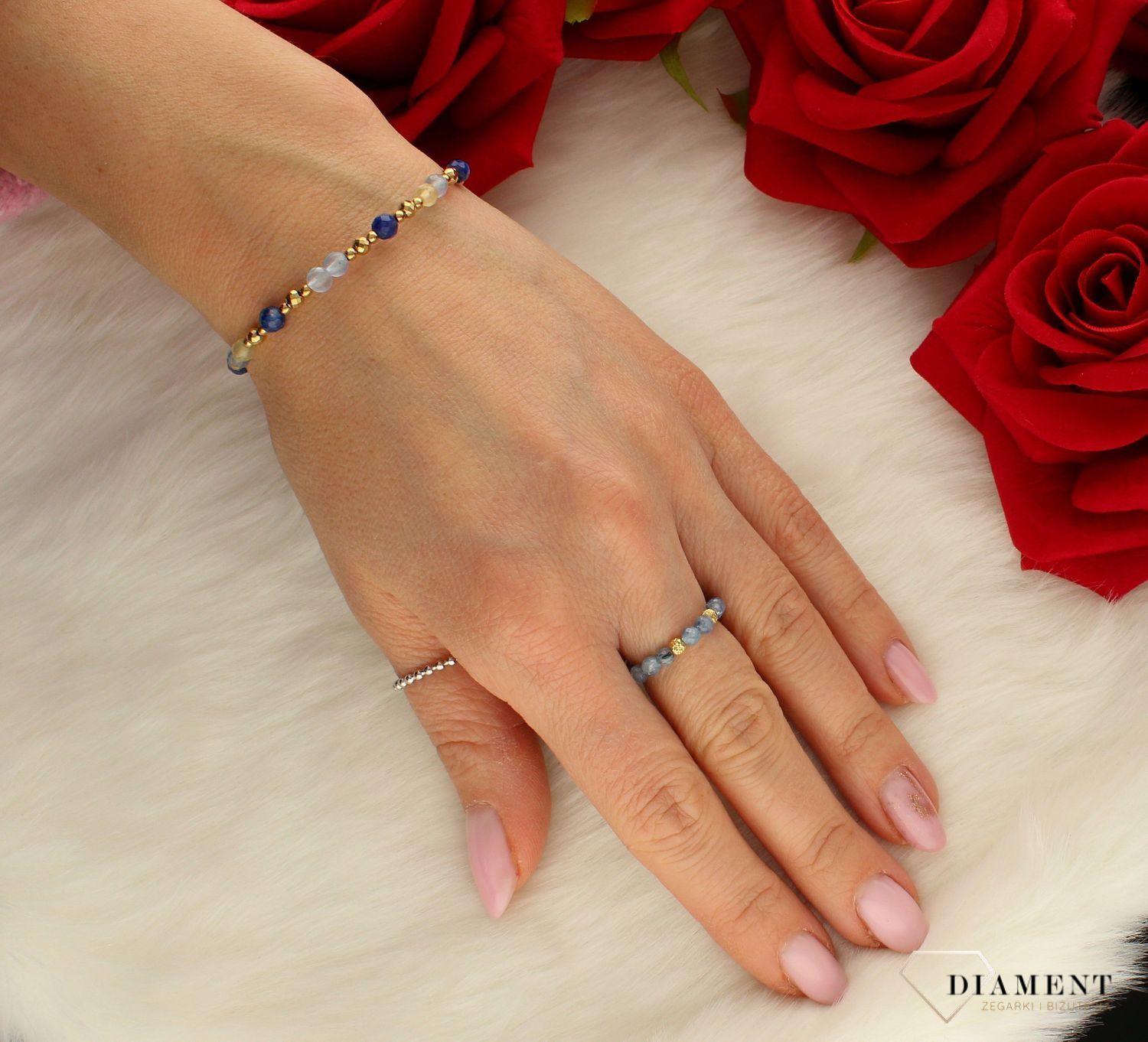 Pierścionek damski złoty 585 z kamieniem kyanite DIA-PRS-8180-585. Modny pierścionek z ozdobnych kuleczek na gumce to intrygująca biżuteria która spodoba się niezależnej, odważnej kobiecie, kochającej wyraziste dodatki, któr.jpg