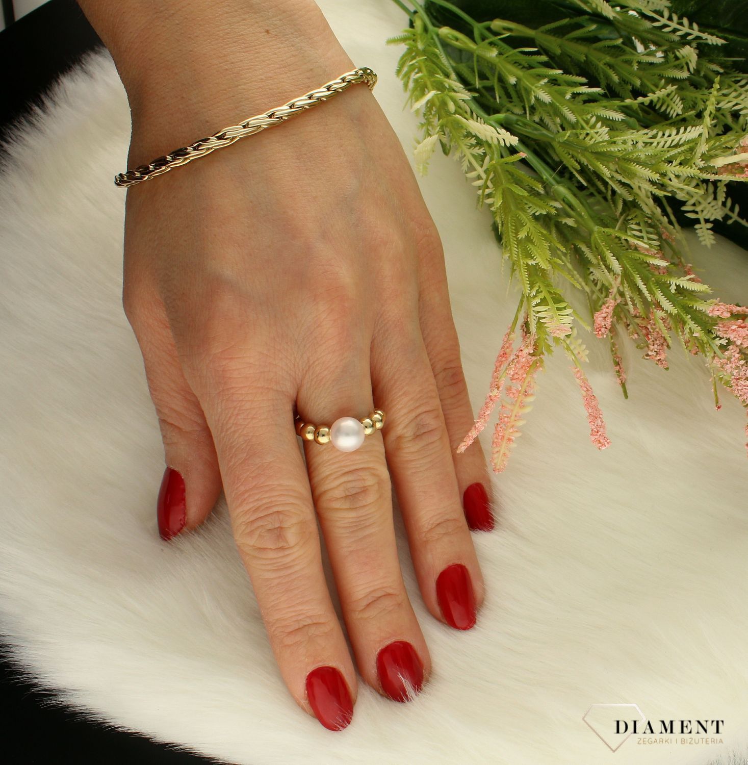 Złoty pierścionek z perłą Dall'Acqua  DIA-PRS-AN0409-585 (1).jpg