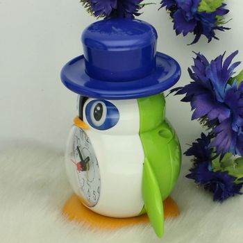 Budzik JVD SR52.6 Pingwin – cichy budzik kwarcowy z alarmem do sypialni.jpg