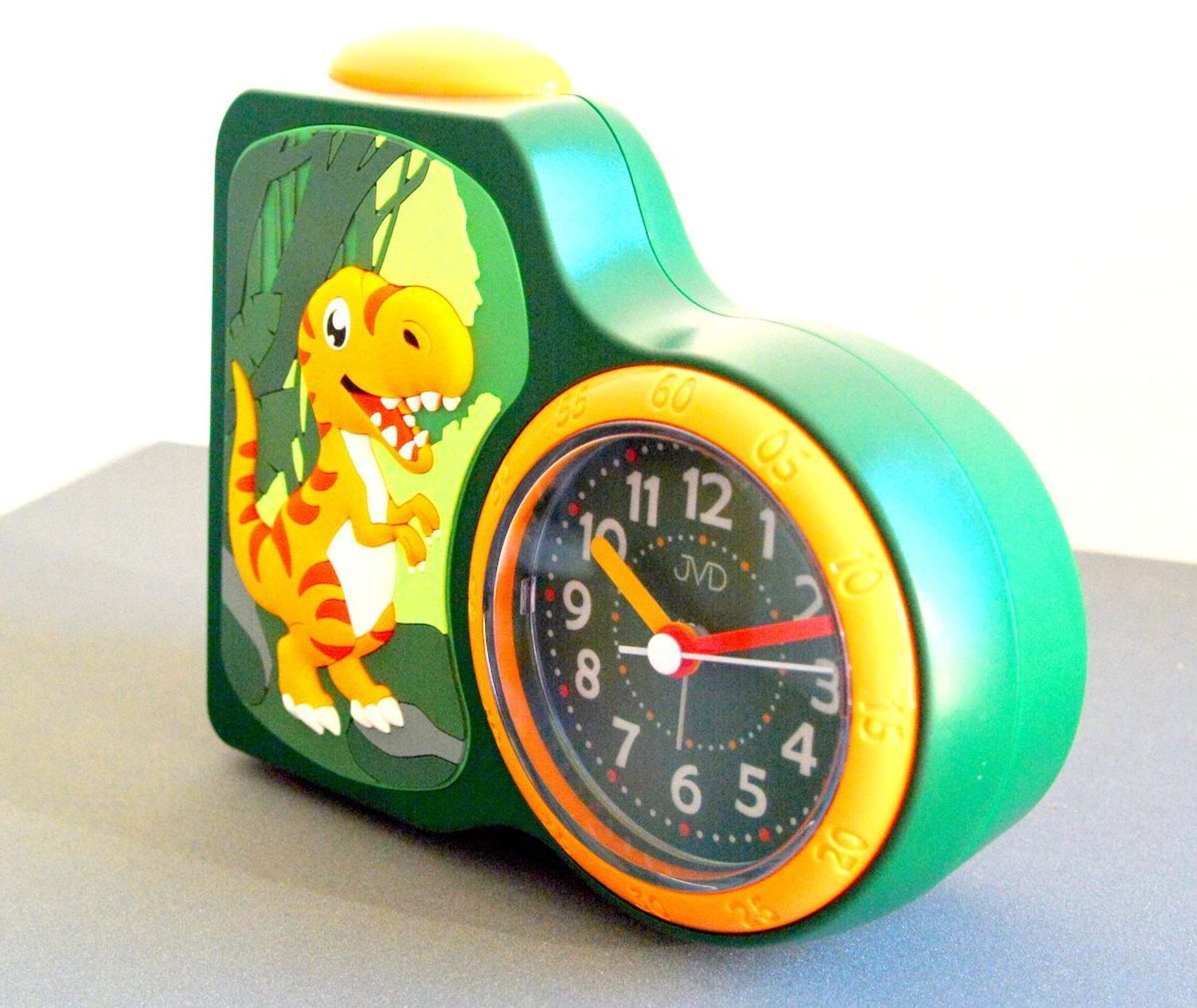 Budzik dziecięcy JVD dla chłopca z dinozaurem SRP163.1.  Budzik dla dzieci. Budzik dla chłopca. Kolorowy budzik na biurko. Śmieszny budzik. Budzik do pokoju dziecięcego. Budzik Dinozaur..jpg