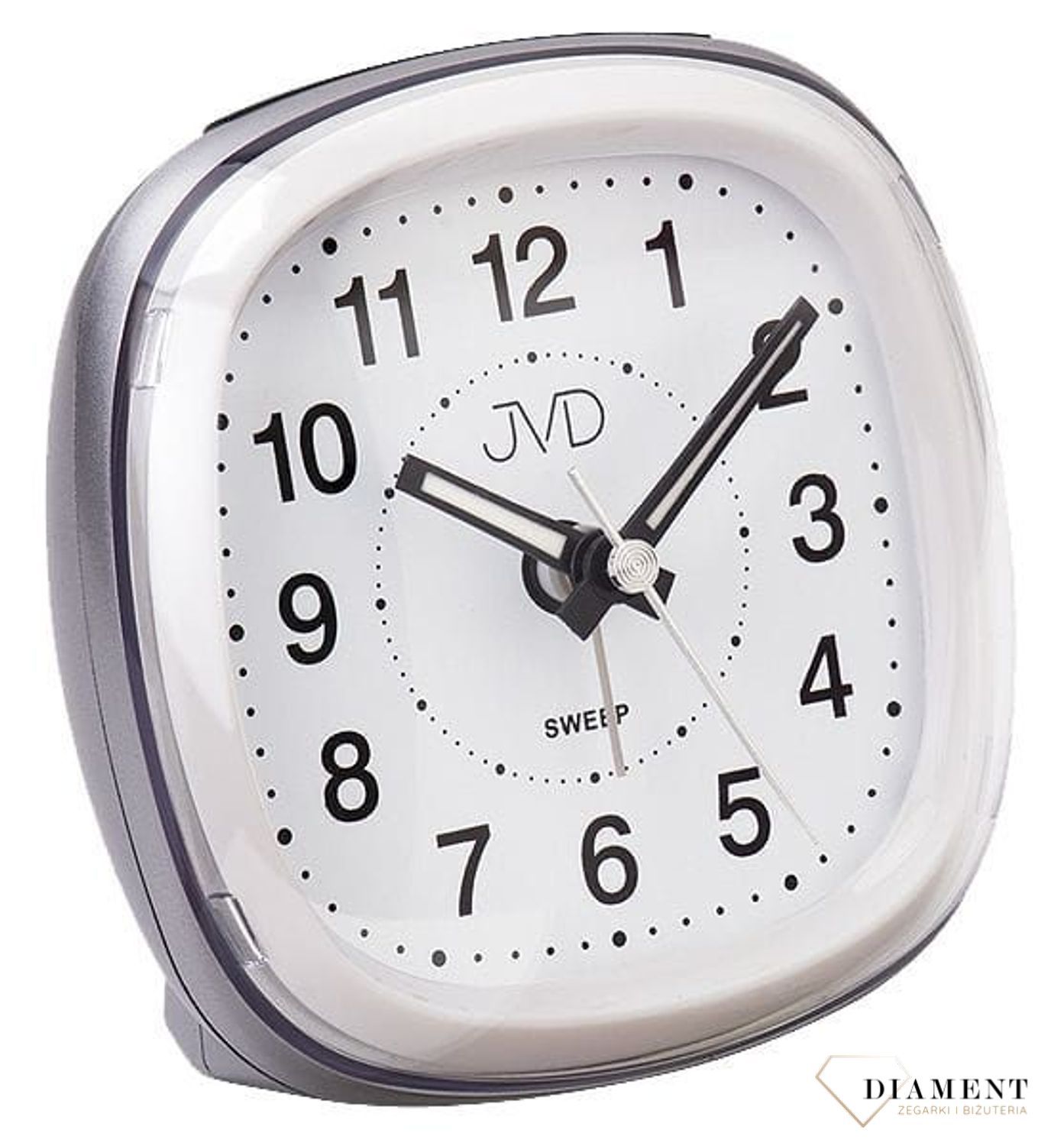 Budzik analogowy JVD SRP811.szary wyposażony jest w kwarcowy mechanizm, zasilany za pomocą baterii. Posiada bardzo wysoką dokładność mierzenia czasu +- 10 sekund w przeciągu 30 dni..jpg