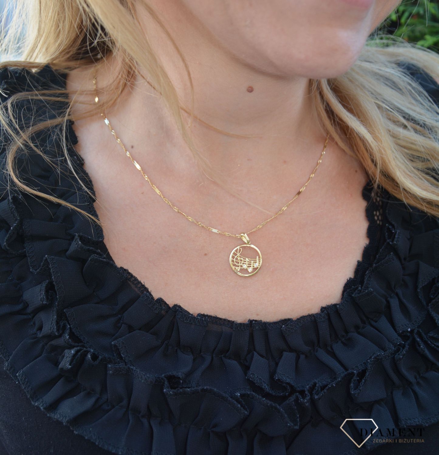 Złota zawieszka 585 okrągła z motywem muzycznym DIA-ZAW-0353-585.jpg