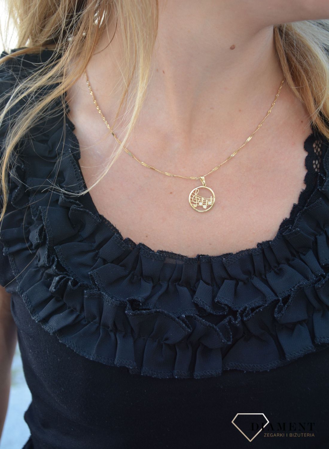 Złota zawieszka 585 okrągła z motywem muzycznym DIA-ZAW-0353-585.jpg