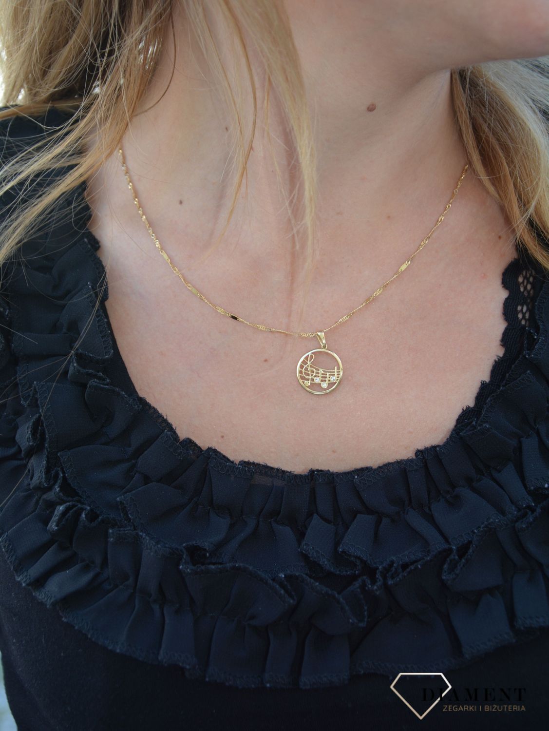 Złota zawieszka 585 okrągła z motywem muzycznym DIA-ZAW-0353-585.jpg