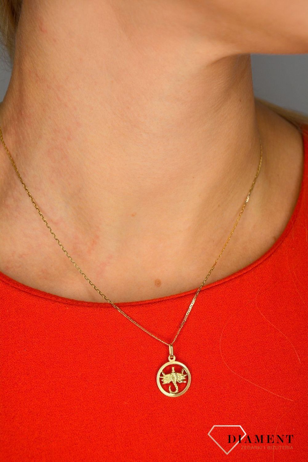 Złota zawieszka 585 znak zodiaku skorpion DIA-ZAW-0840-585 💎 Złota zawieszka w okrągłym kształcie ze znakiem zodiaku skorpion.jpg