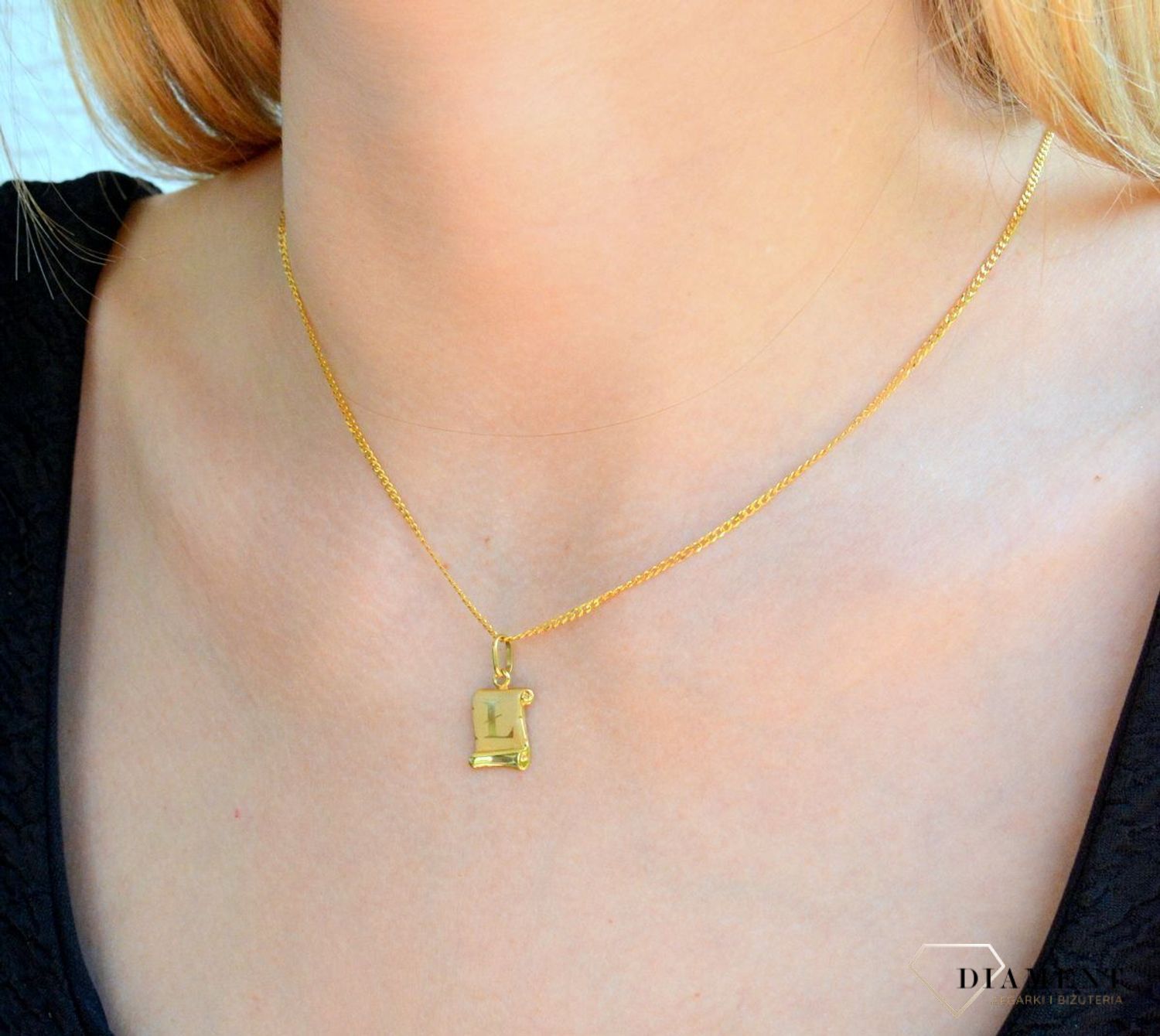 Złota zawieszka literka Ł na papirusie DIA-ZAW-0849-585. Wisiorek został wykonany z najwyższej jakości złota próby 585  na papirusie. Zawieszka złota literka. Złota literka Ł. Złoty wisiorek 585. Literka Ł do łańcuszka. Zawies.jpg