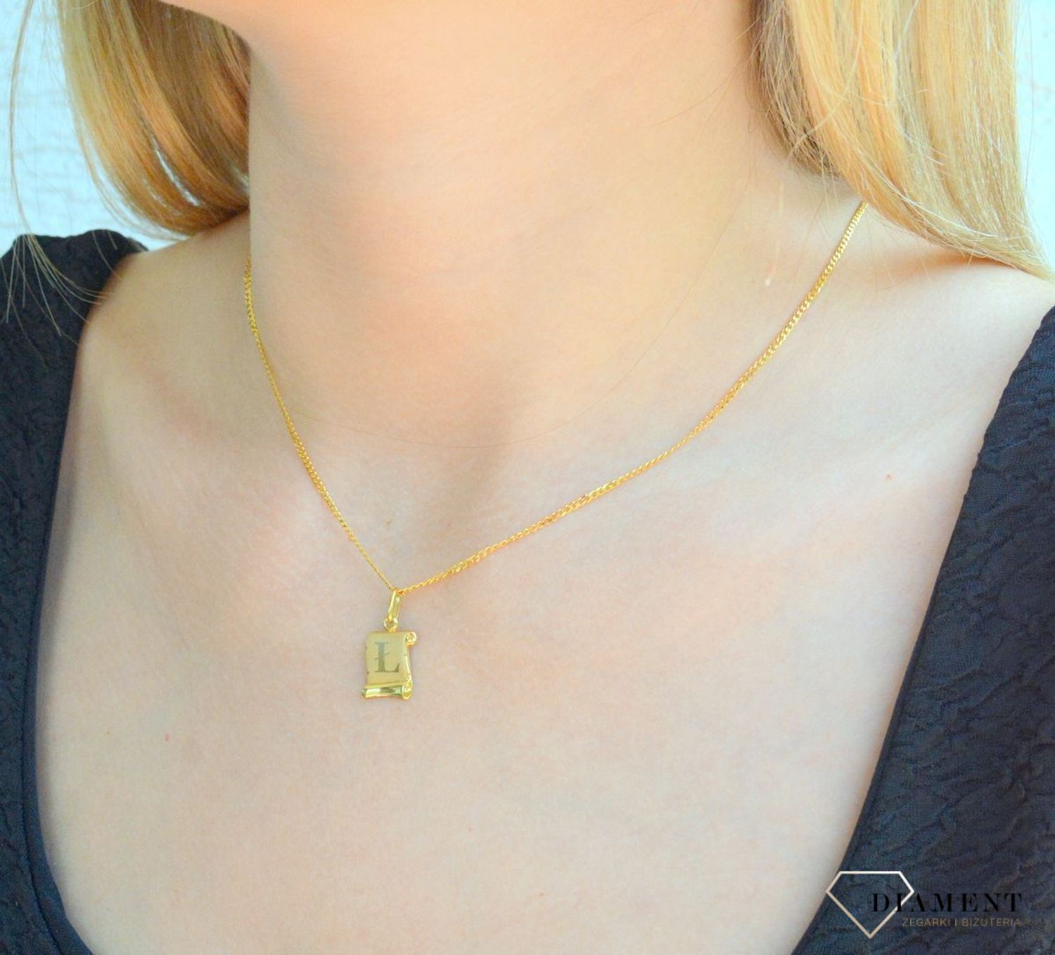 Złota zawieszka literka Ł na papirusie DIA-ZAW-0849-585. Wisiorek został wykonany z najwyższej jakości złota próby 585  na papirusie. Zawieszka złota literka. Złota literka Ł. Złoty wisiorek 585. Literka Ł do łańcuszka. Zawies.jpg