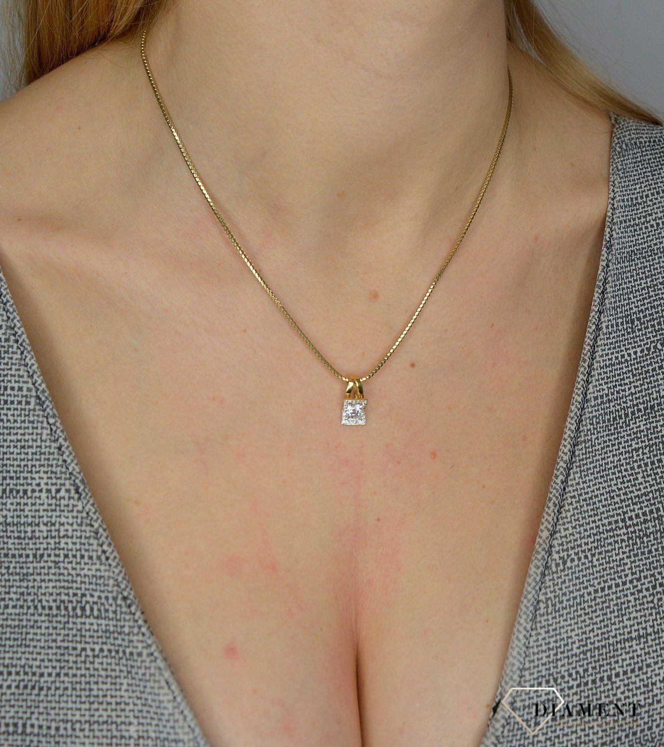 Złota zawieszka 585 cyrkonia.jpg