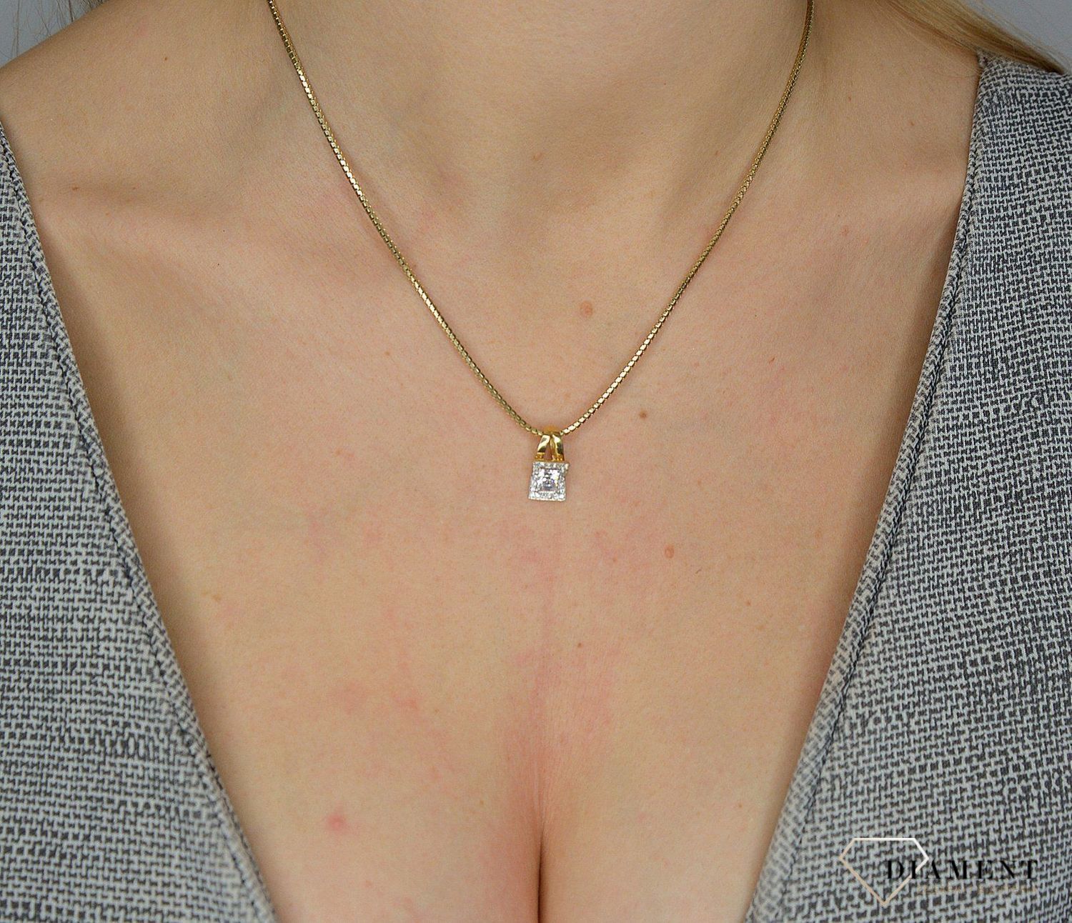 Złota zawieszka 585 cyrkonia.jpg