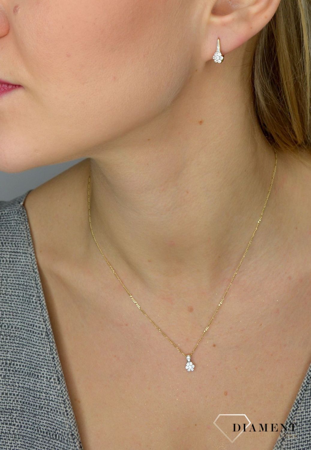Złota zawieszka 585 kwiatek w cyrkoniach DIA-ZAW-0999K-585.jpg