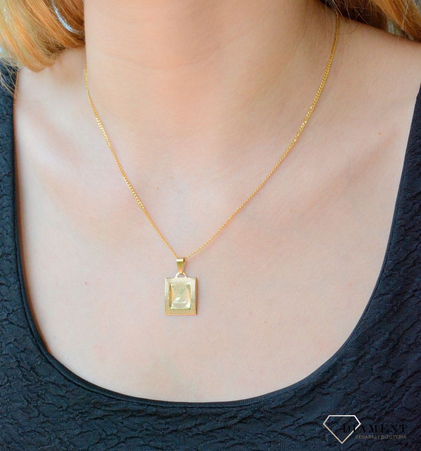 Złota zawieszka literka Z na papirusie DIA-ZAW-10022-333.  Wisiorek został wykonany z najwyższej jakości złota próby 333 na papirusie. Złoty wisiorek literka Z na papirusie. Zawieszka damska z literką. Idealna zawieszka na pre.jpg