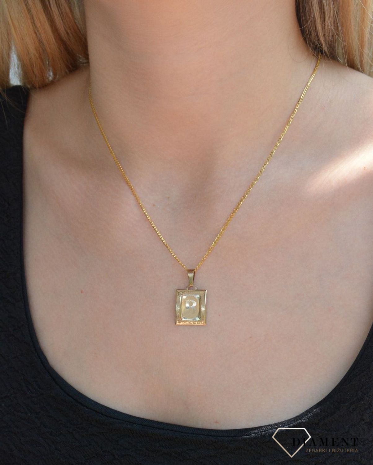 Złota zawieszka literka B na papirusie DIA-ZAW-10023-333. Wisiorek został wykonany z najwyższej jakości złota próby 333 na papirusie. Złoty wisiorek literka B na papirusie. Zawieszka damska z literką. Idealna zawieszka na prez.jpg