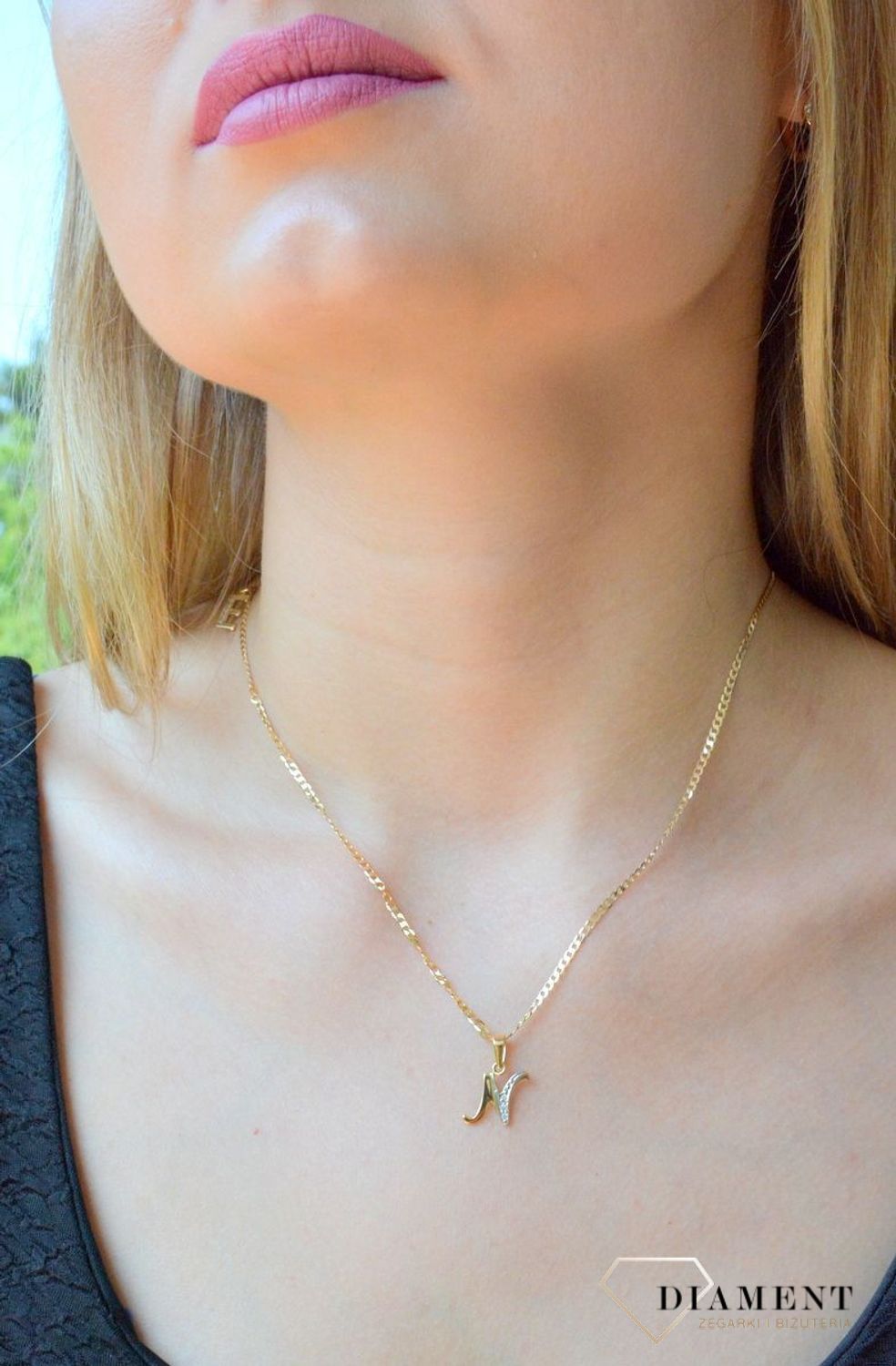 Złota zawieszka 585 literka N ozdobiona cyrkonią DIA-ZAW-10048-585. Złoty wisiorek próby 585. Wisiorek literka z cyrkoniami. Zawieszka złota do łańcuszka literka N. Literka zawieszka idealny pomysł na prezent..jpg