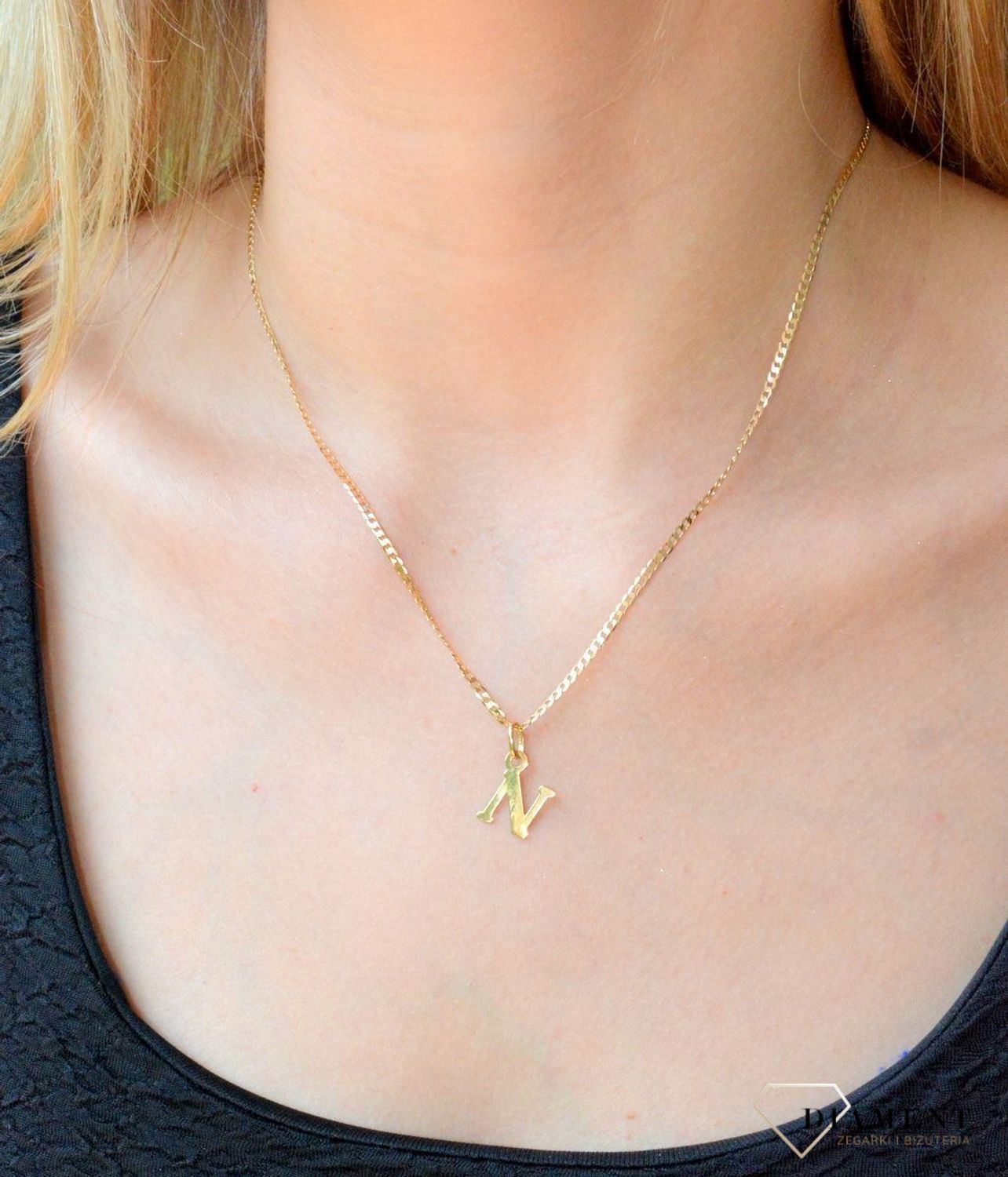 Złota zawieszka 585 literka N DIA-ZAW-10063-585. Wisiorek został wykonany z wysokiej jakości złota próby 585. Wisiorek z literką N. Literka N zawieszka idealna na prezent. Złota zawieszka damska literka..jpg