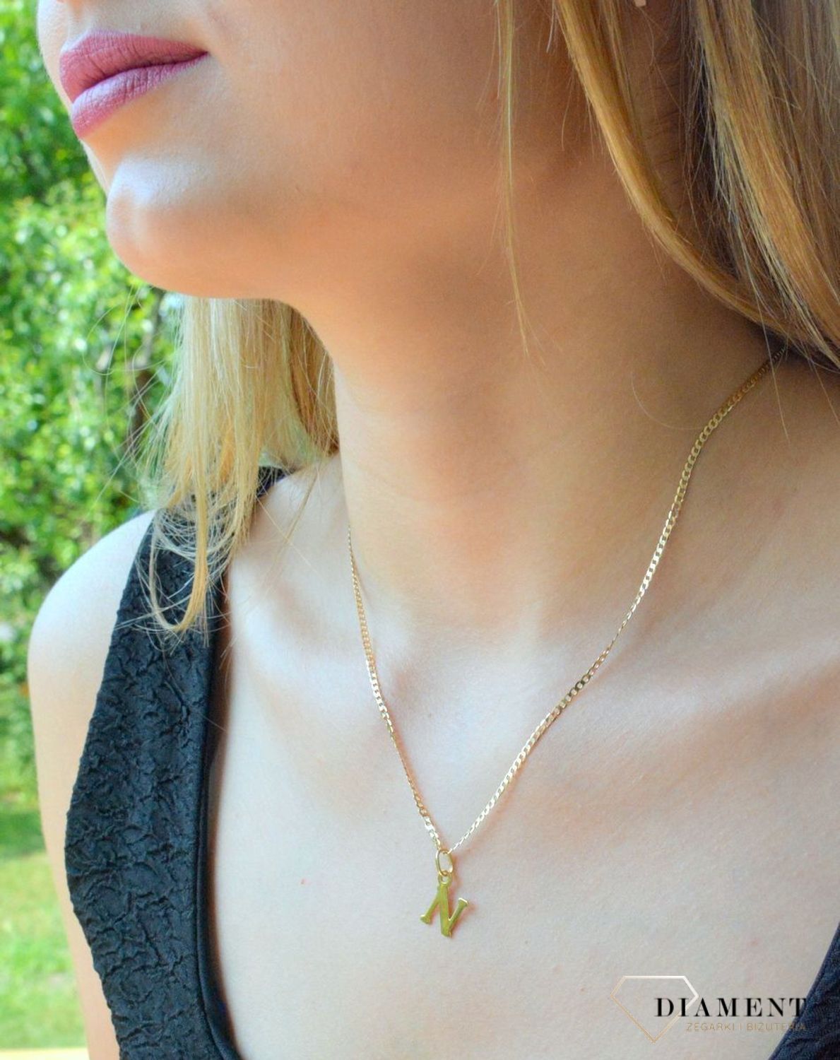 Złota zawieszka 585 literka N DIA-ZAW-10063-585. Wisiorek został wykonany z wysokiej jakości złota próby 585. Wisiorek z literką N. Literka N zawieszka idealna na prezent. Złota zawieszka damska literka..jpg