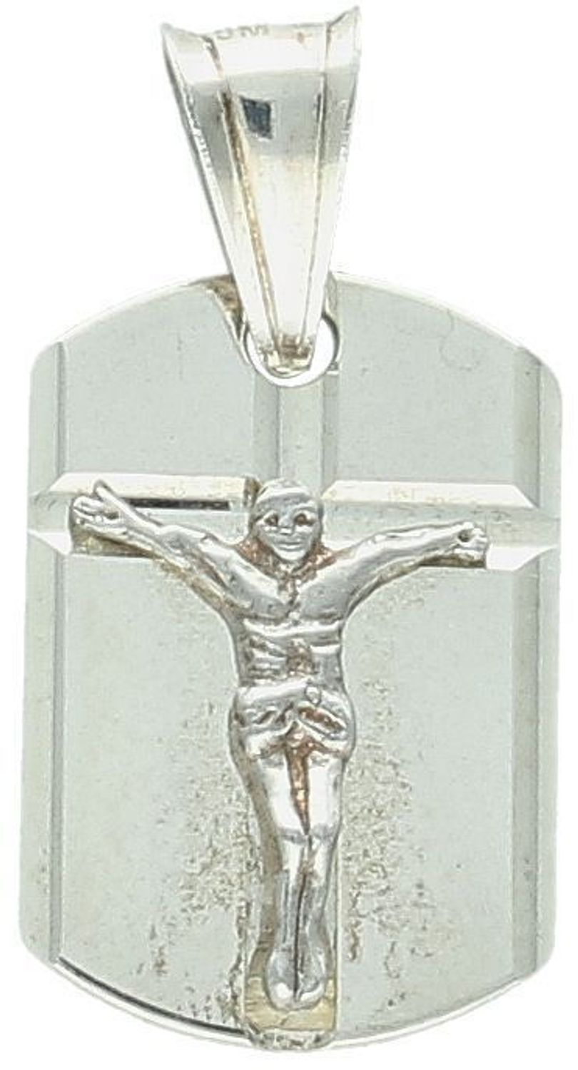 Srebrna zawieszka medalik próby 925 z wizerunkiem Jezusa na krzyżu na prostokątnej blaszce. Waga 2,00 g, szerokość 1,2 cm, długość 2,3 cm. Symbol wiary i ochrony w eleganckim wydaniu.1.jpg