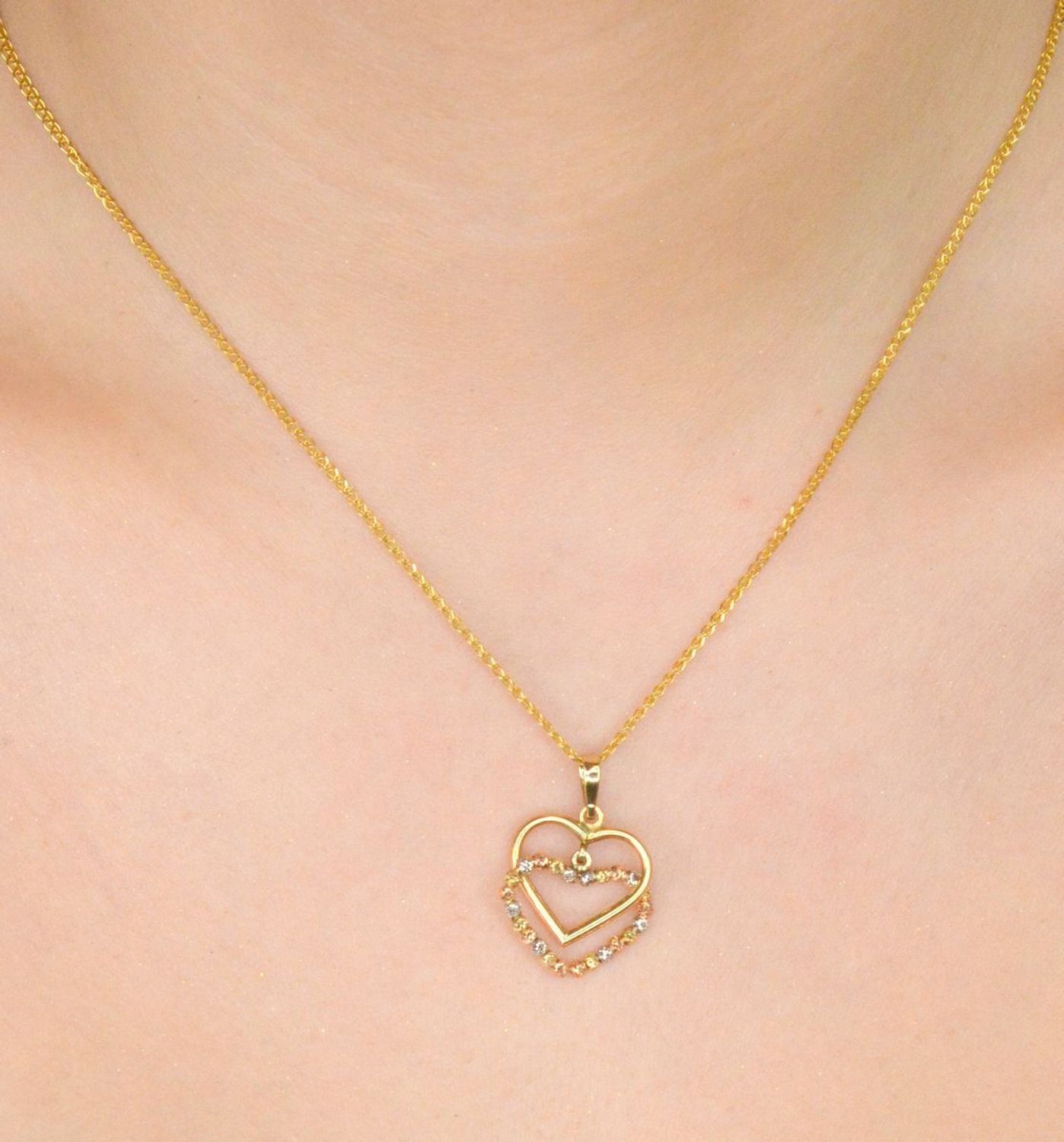 Zawieszka złota dwa serca pr 585, DIA-ZAW-10865-585  Złota zawieszka próby 585 o wadze 1,35 grama to elegancki i nowoczesny dodatek, który zachwyca subtelnością i oryginalnym designem.1.jpg