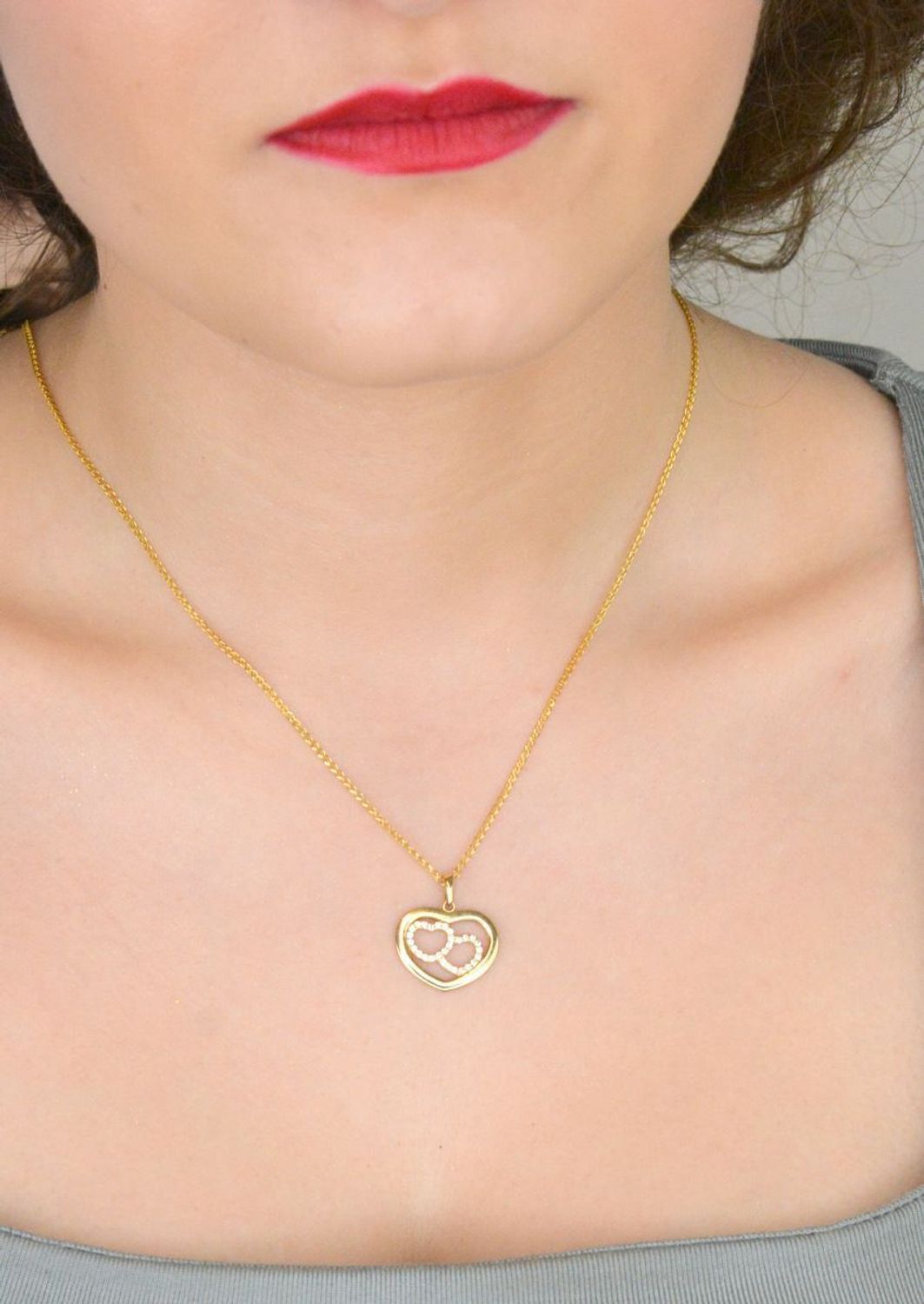 Zawieszka złota serce z cyrkoniami pr 585, DIA-ZAW-10906-585  Zawieszka w kształcie serca, wykonana z wysokiej jakości złota próby 585, to elegancka i 2.jpg