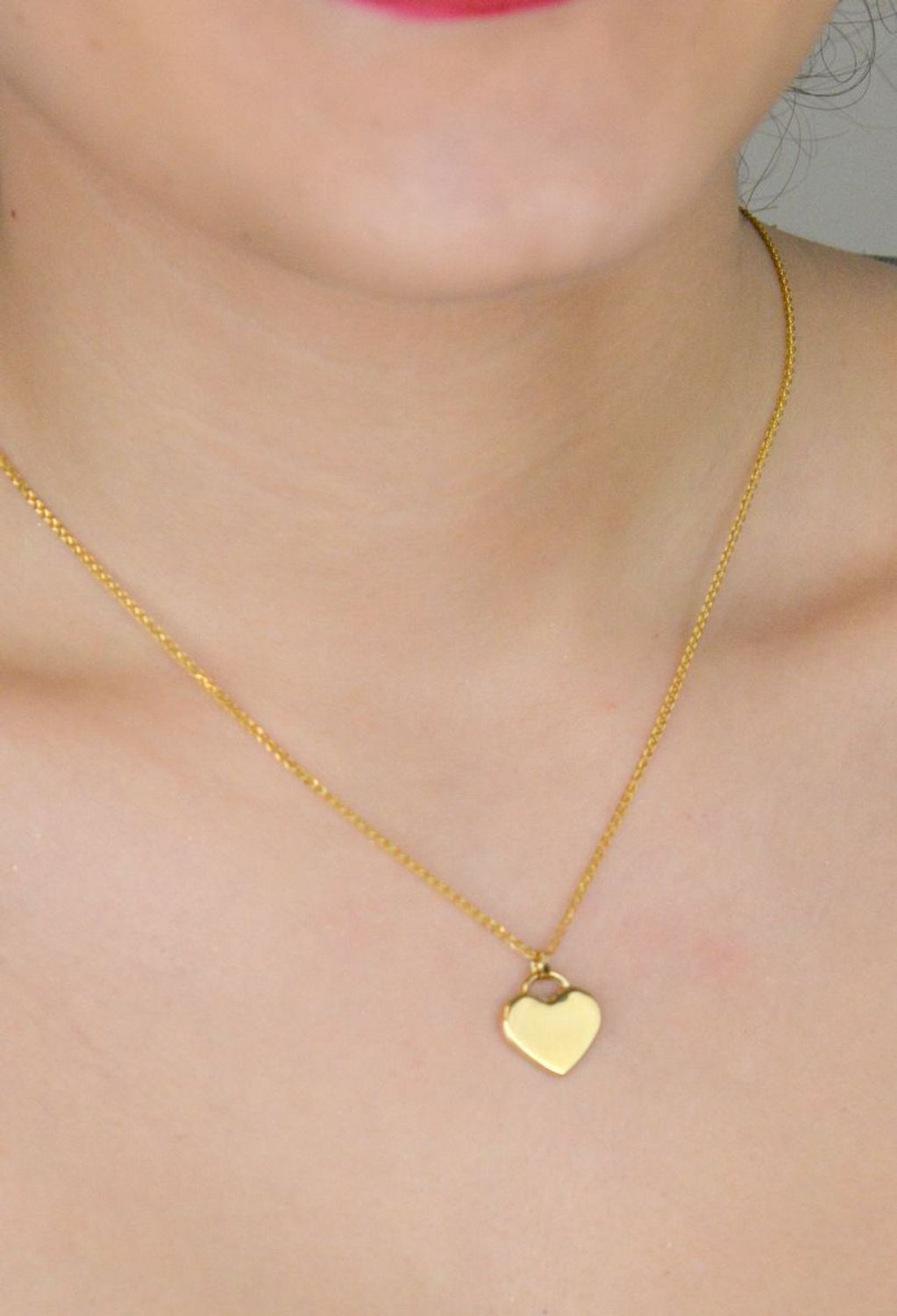 Zawieszka złota serce gładkie pr 585, DIA-ZAW-10993-585 Złota zawieszka próby 585 o wadze 0,85 grama w kształcie gładkiego serca to elegancki i ponadczasowy dodatek1.jpg