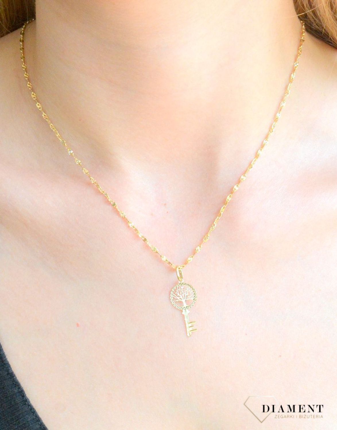 Złota zawieszka 585 drzewko szczęścia z kluczem DIA-ZAW-11422-585.jpg