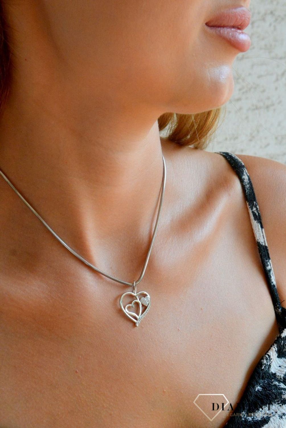 Srebrna zawieszka damska 925 potrójne serce z cyrkoniami DIA-ZAW-11848-925.jpg