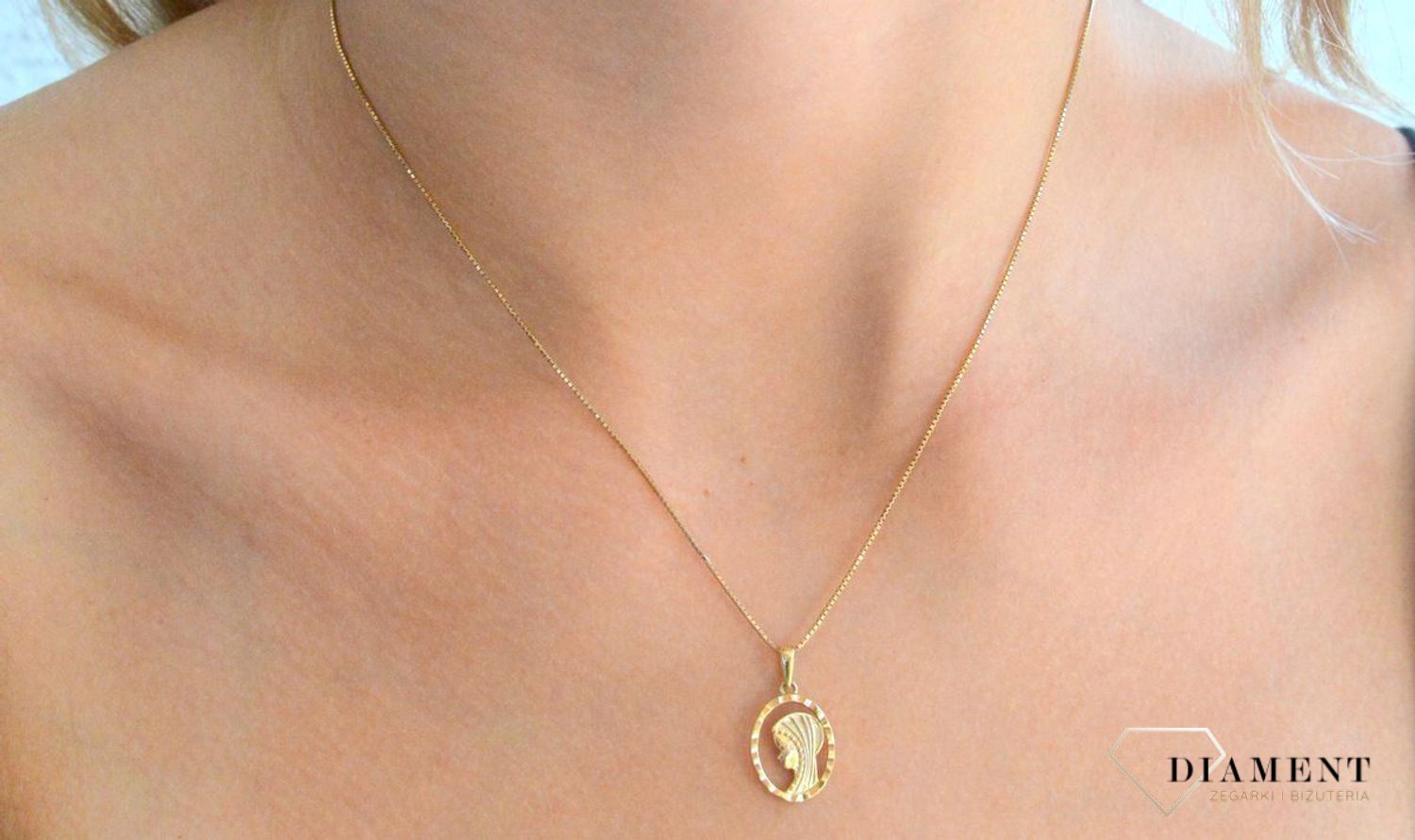 Zawieszka złota medlaik 585 z wizerunkiem Matki Boskiej DIA-ZAW-11914-585.jpg