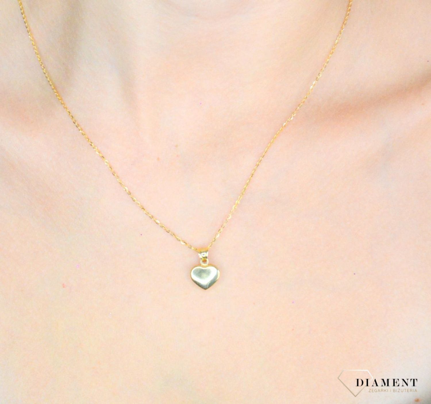 Złota zawieszka 585 wypukłe gładkie serduszko DIA-ZAW-11943-585. Złota zawieszka damska. Złota zawieszka próby 585. Złota zawieszka gładkie serce. Złota zawieszka idealna na prezent..jpg