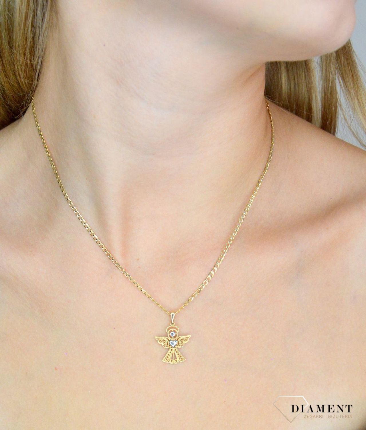 Złota zawieszka 585 ażurowy aniołek DIA-ZAW-12003-585. Złota zawieszka damska. Złota zawieszka próby 585. Złota zawieszka aniołek. Złota zawieszka idealna na prezent..jpg