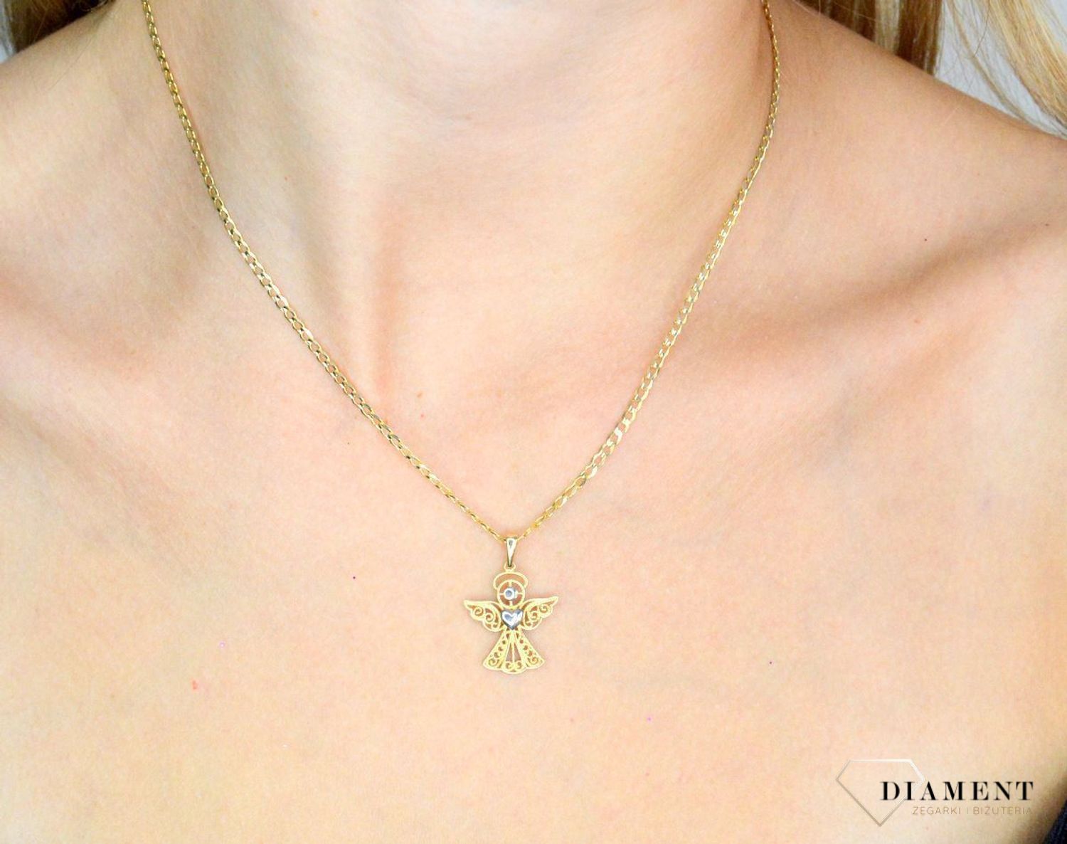 Złota zawieszka 585 ażurowy aniołek DIA-ZAW-12003-585. Złota zawieszka damska. Złota zawieszka próby 585. Złota zawieszka aniołek. Złota zawieszka idealna na prezent..jpg