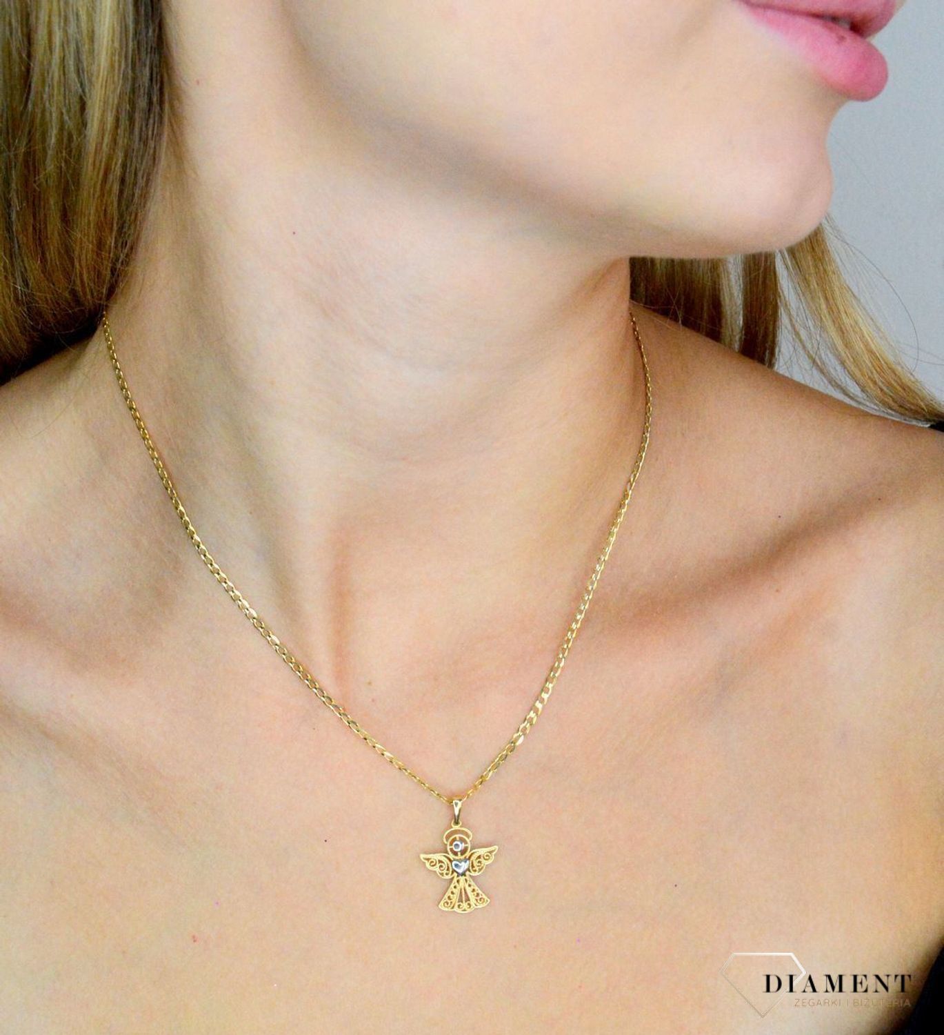 Złota zawieszka 585 ażurowy aniołek DIA-ZAW-12003-585. Złota zawieszka damska. Złota zawieszka próby 585. Złota zawieszka aniołek. Złota zawieszka idealna na prezent..jpg