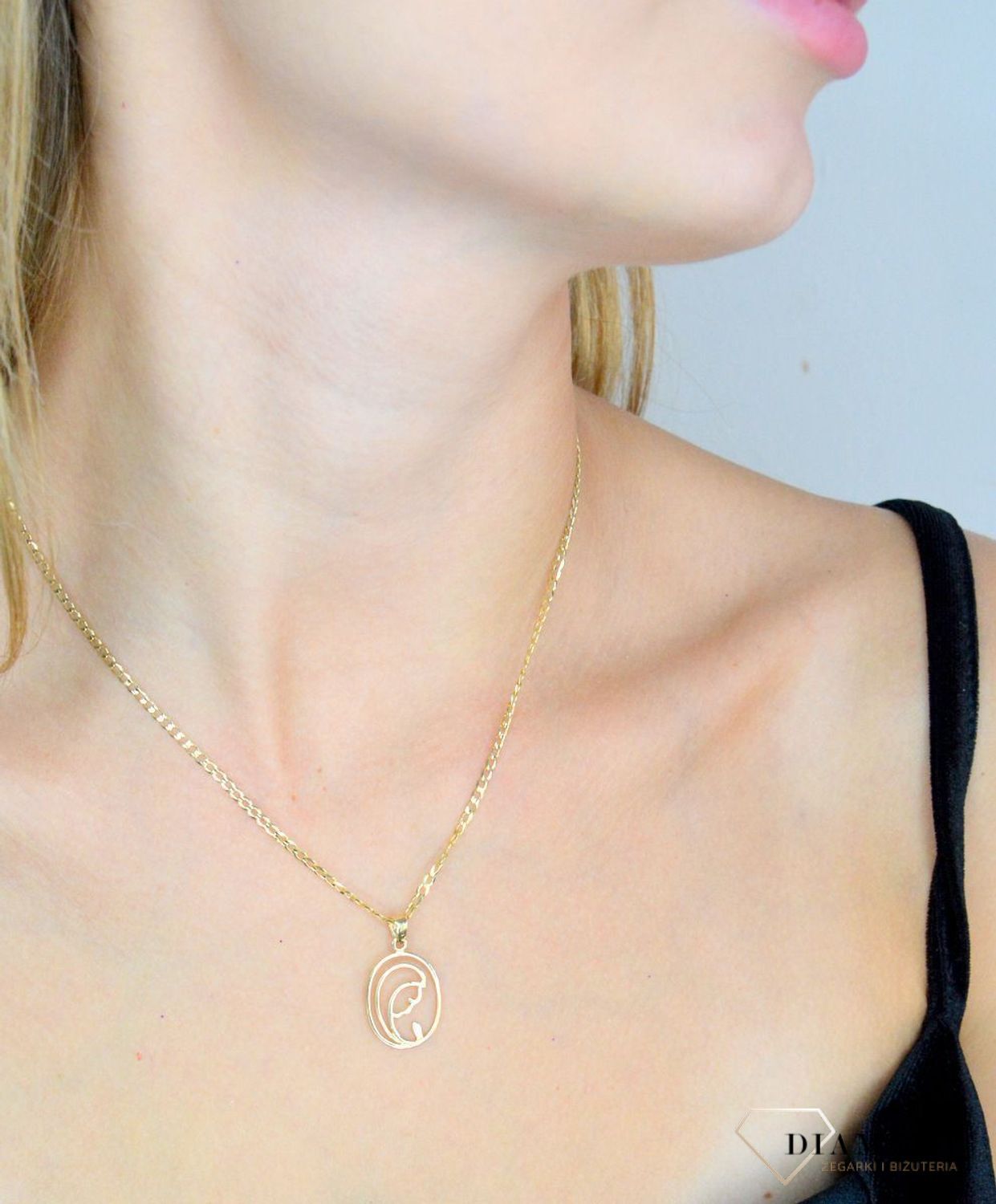 Złota zawieszka 585 owalny medalik z Maryją DIA-ZAW-12010-585. Złota zawieszka damska. Złota zawieszka próby 585. Złota zawieszka medalik święty. Złota zawieszka idealna na prezent. Medalik na chrzest, komunię ..jpg