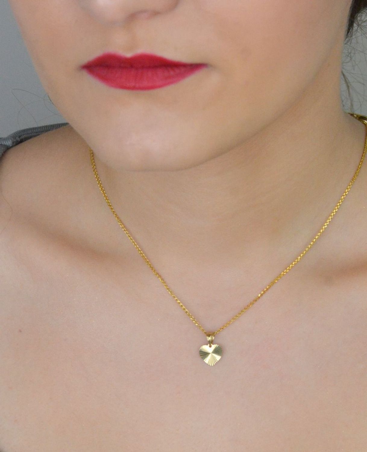 Zawieszka złota małe serduszko z grawerem pr 585, DIA-ZAW-12118-585 Małe serduszko wykonane z wysokiej jakości złota próby 585 o masie 0,47 grama 1.jpg